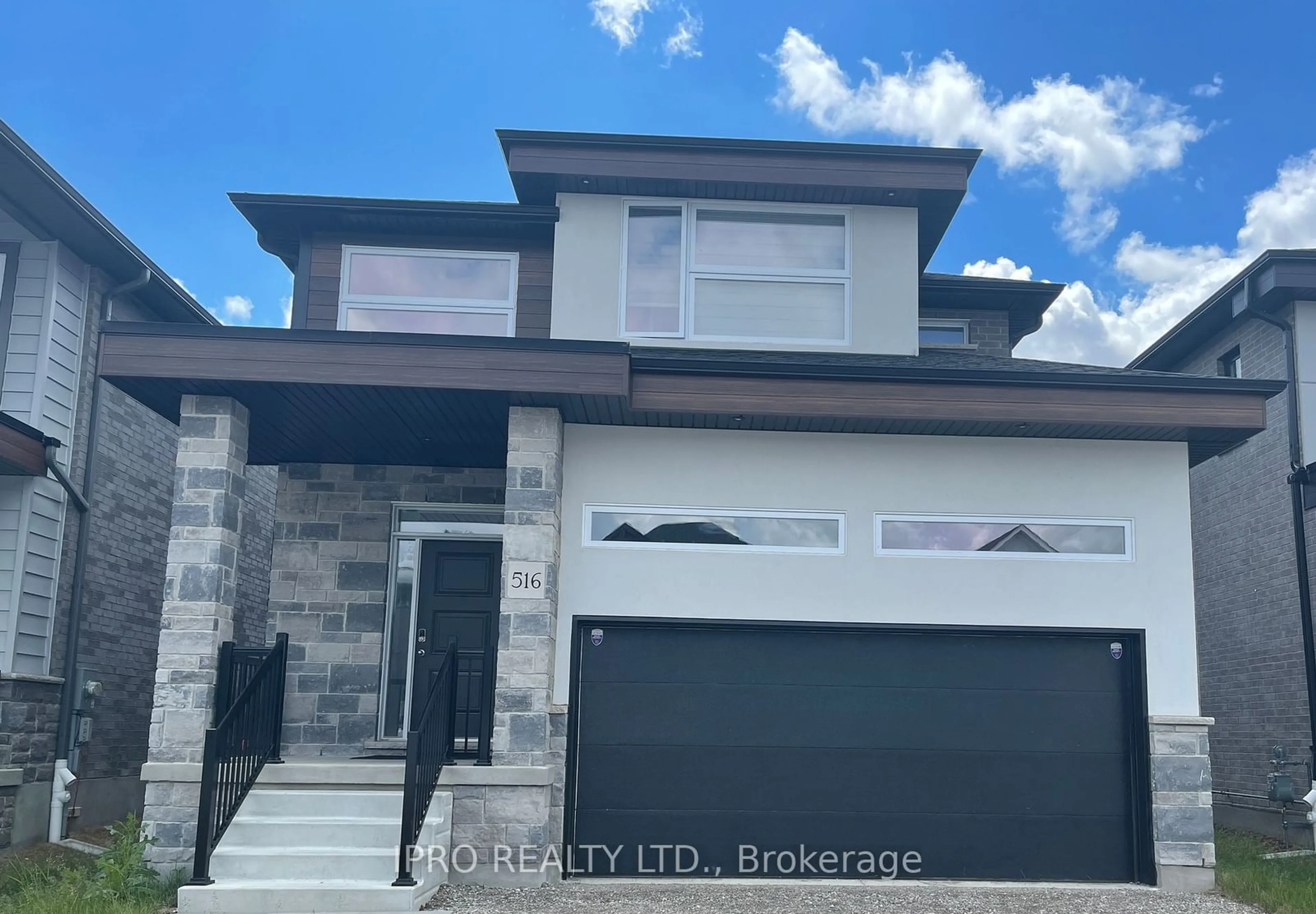 Home with brick exterior material, street for 516 Doonwoods Cres, Kitchener Ontario N2P 0E5