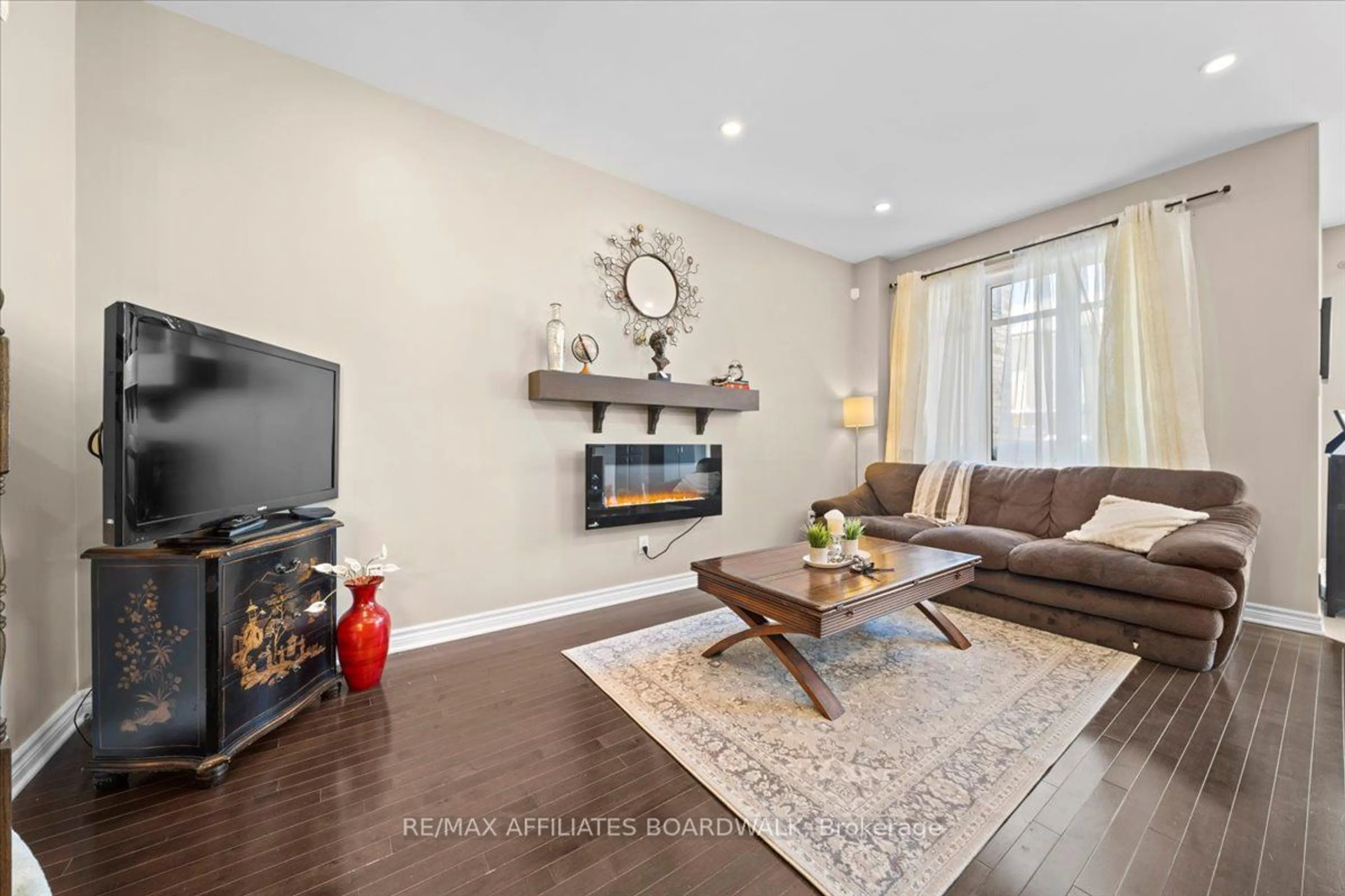 Living room with furniture, unknown for 107 Watchhorn Grve, Blossom Park - Airport and Area Ontario K1V 2N3