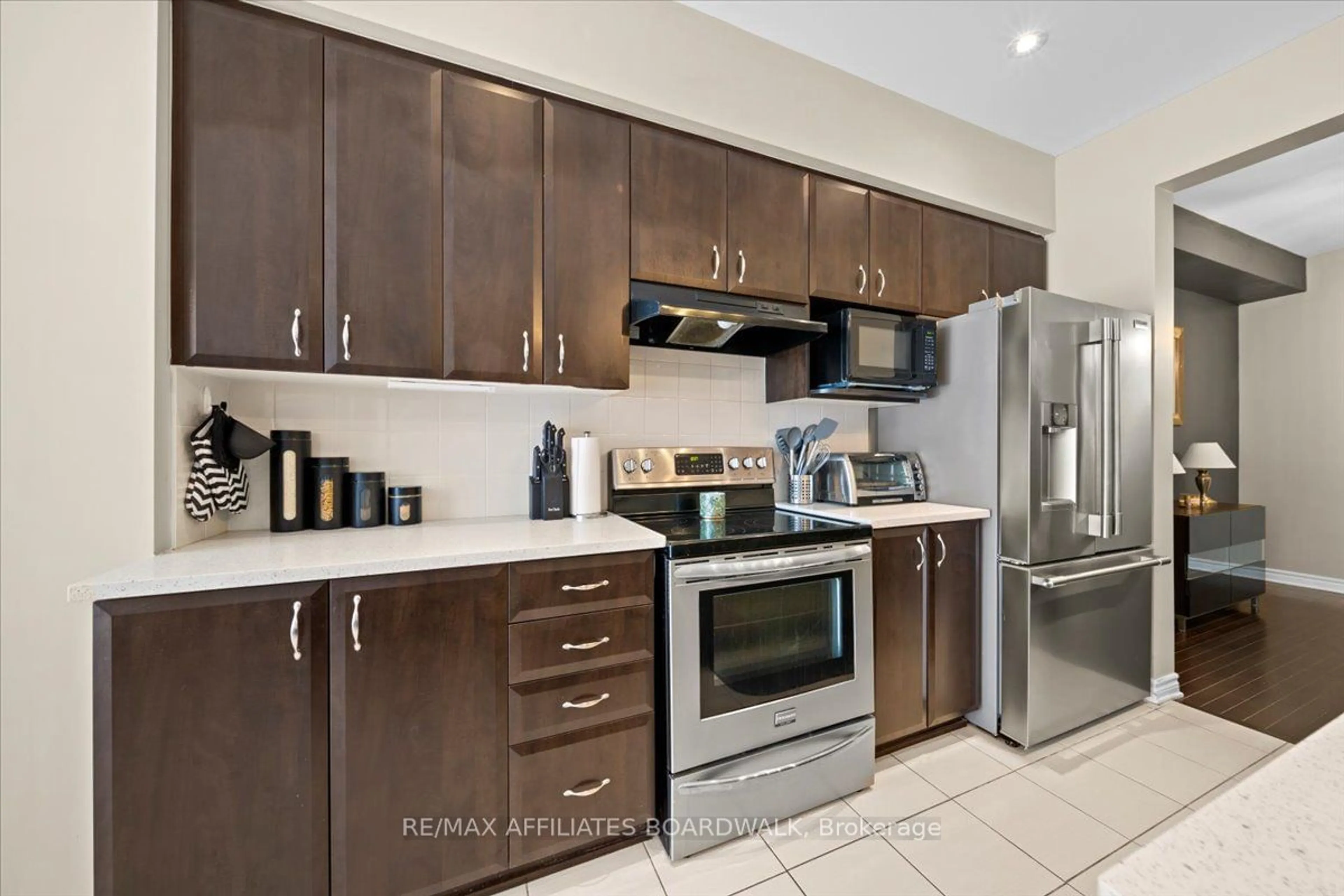 Standard kitchen, ceramic/tile floor for 107 Watchhorn Grve, Blossom Park - Airport and Area Ontario K1V 2N3