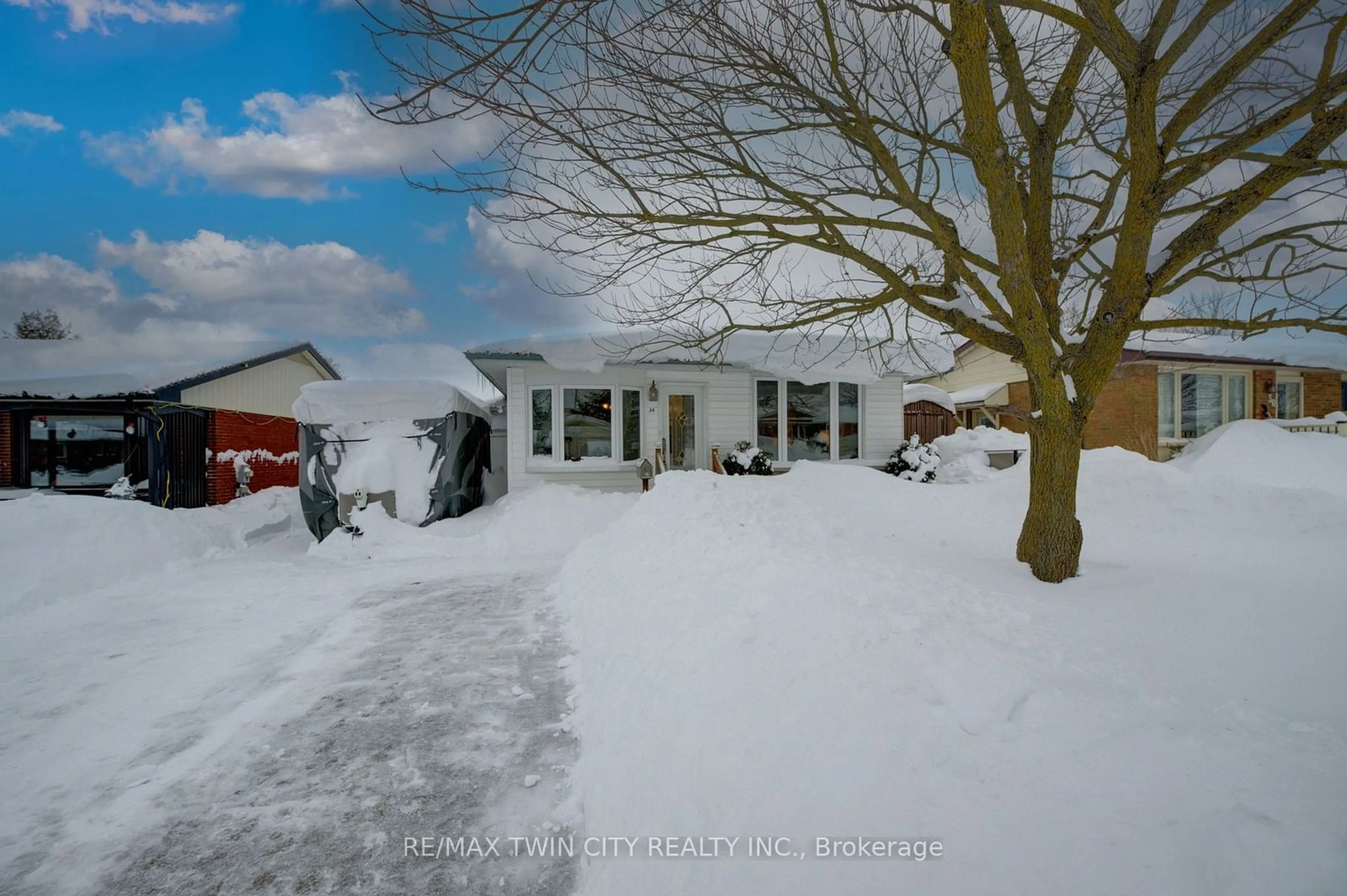 A pic from outside/outdoor area/front of a property/back of a property/a pic from drone, street for 36 Riverside Dr #(New Hamburg), Wilmot Ontario N3A 2H6