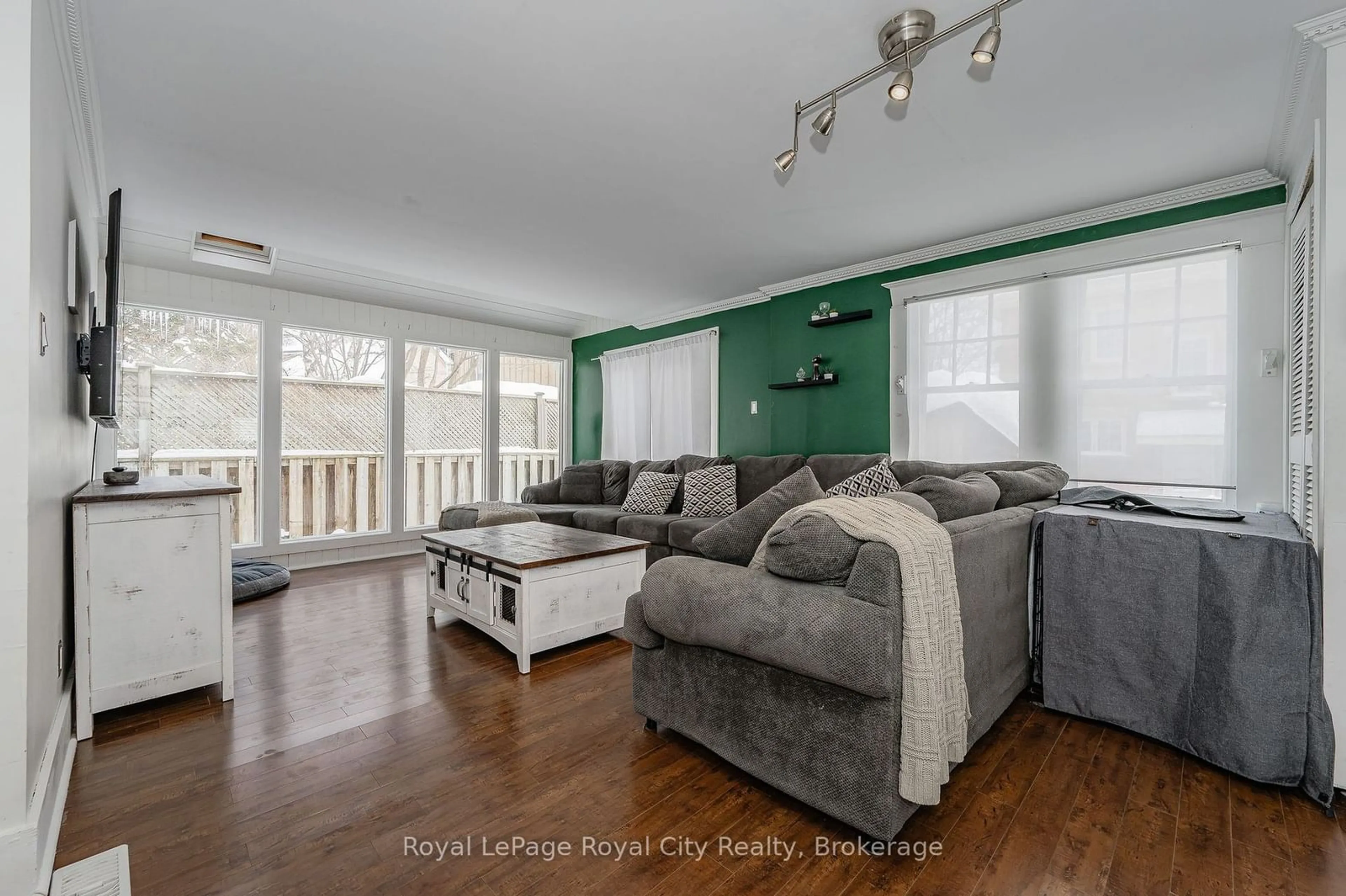 Living room with furniture, wood/laminate floor for 81 Yorkshire St, Guelph Ontario N1H 5B3