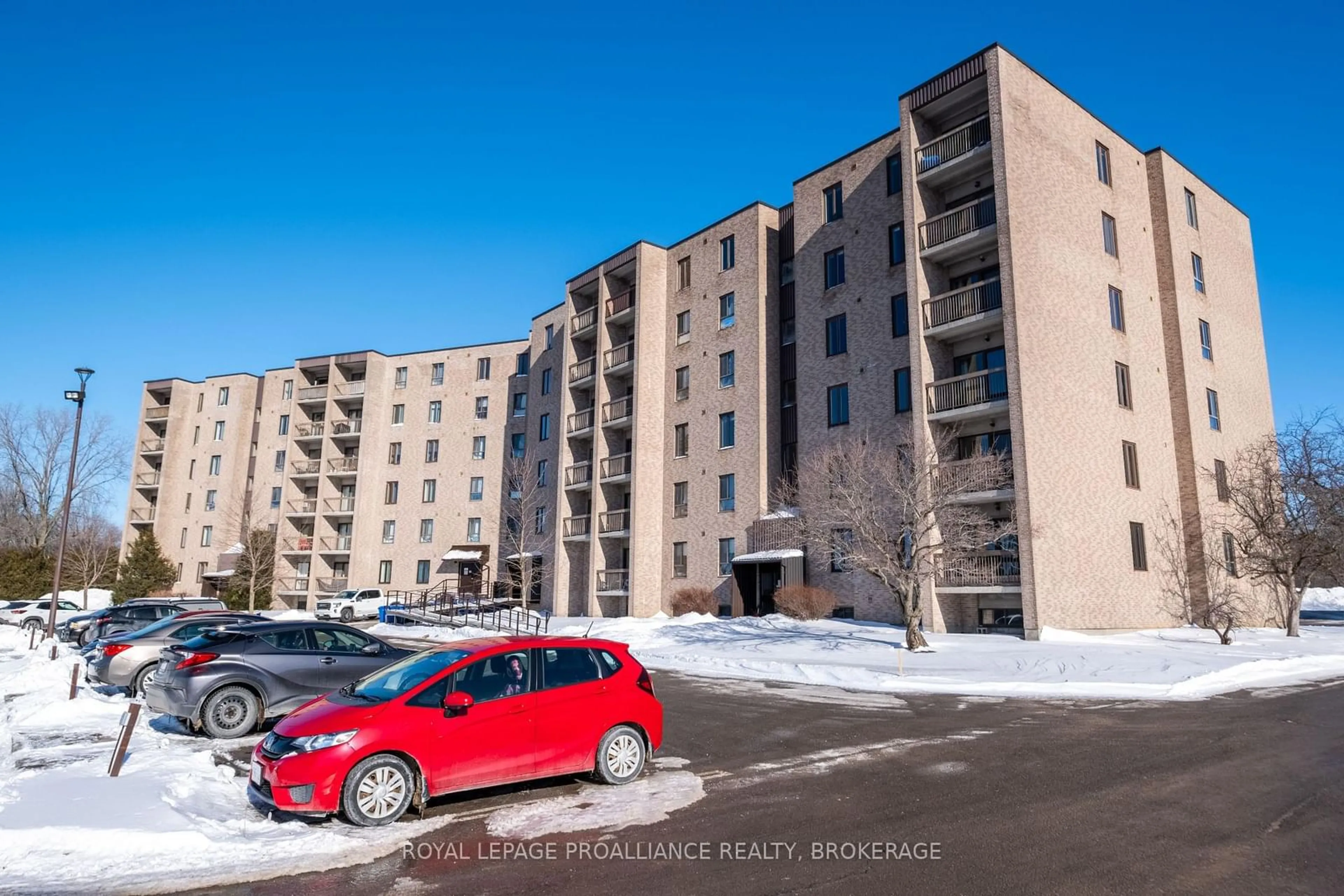 A pic from outside/outdoor area/front of a property/back of a property/a pic from drone, unknown for 358 Queen Mary Rd #208, Kingston Ontario K7M 7E8