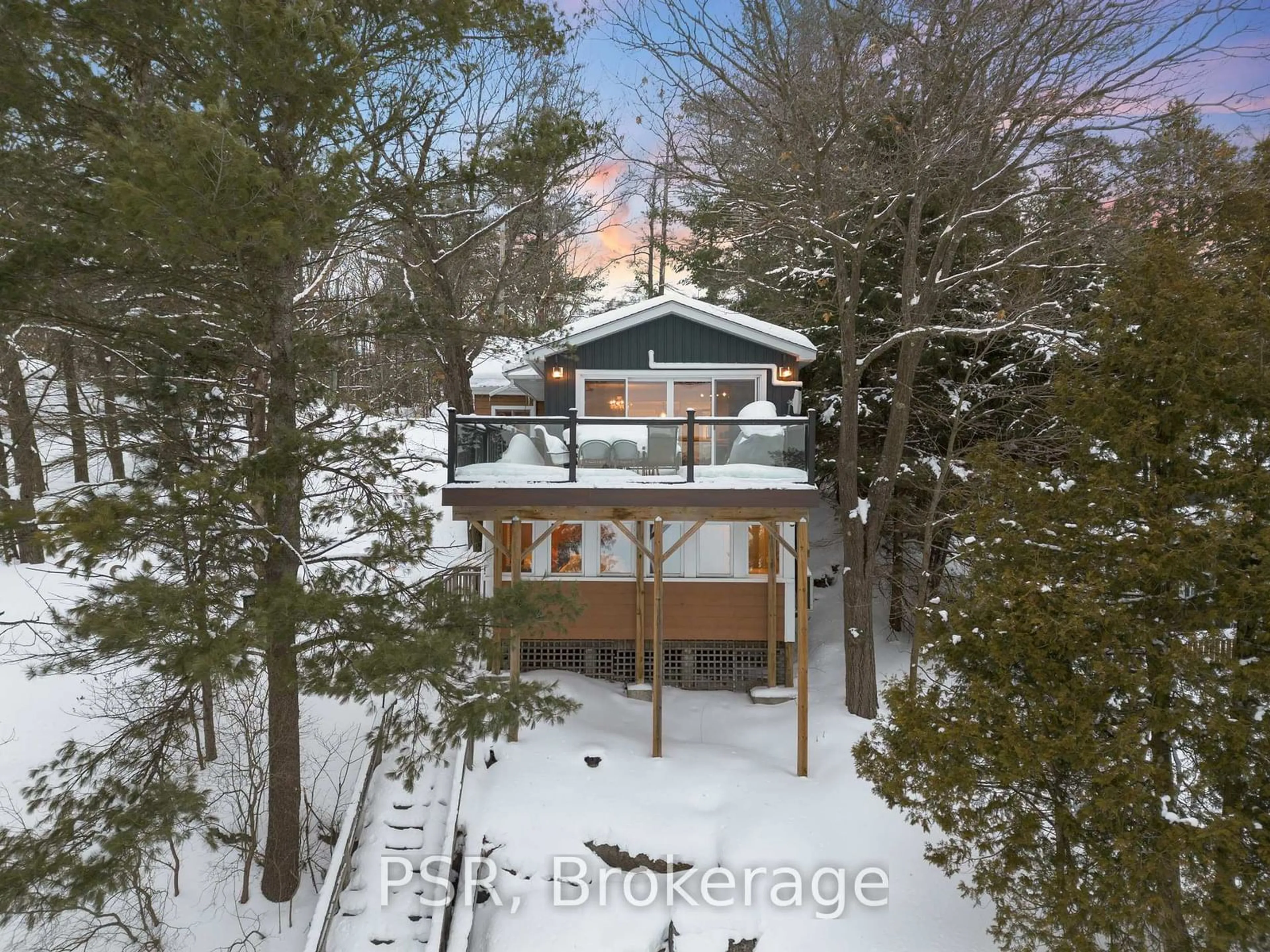 A pic from outside/outdoor area/front of a property/back of a property/a pic from drone, forest/trees view for 1166 Parkers Point Rd, Gravenhurst Ontario P1P 1R2