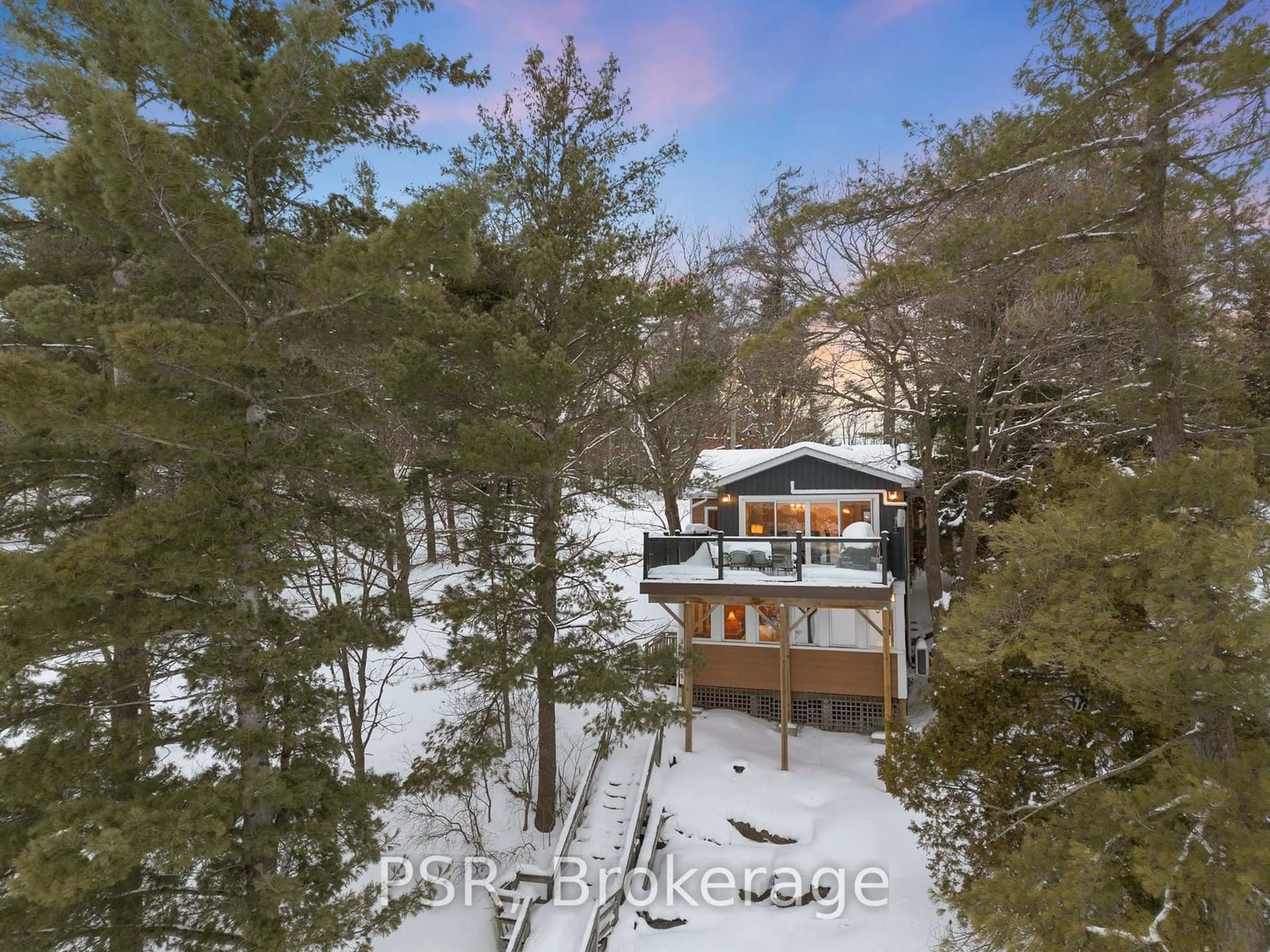 A pic from outside/outdoor area/front of a property/back of a property/a pic from drone, forest/trees view for 1166 Parkers Point Rd, Gravenhurst Ontario P1P 1R2