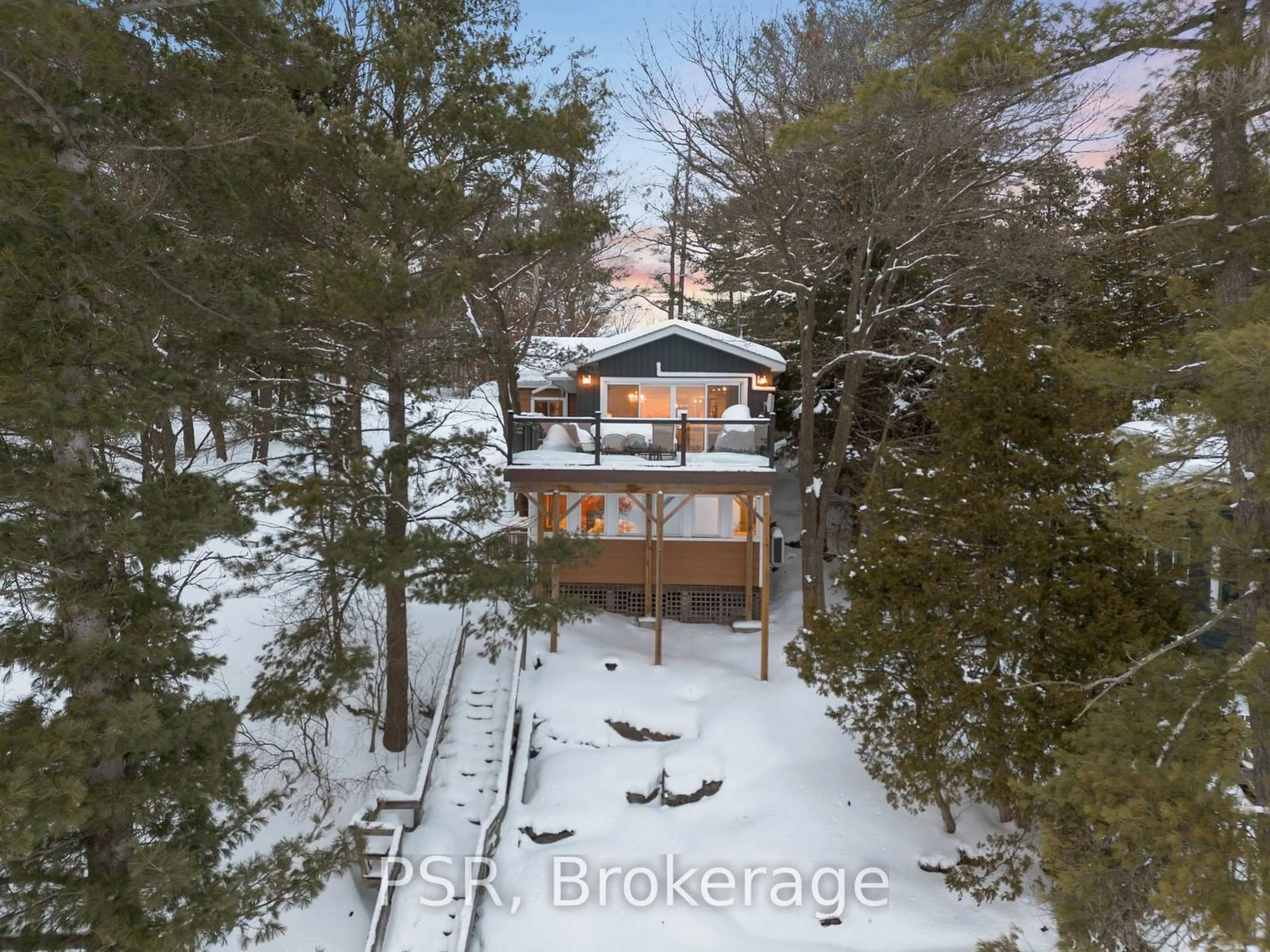 A pic from outside/outdoor area/front of a property/back of a property/a pic from drone, forest/trees view for 1166 Parkers Point Rd, Gravenhurst Ontario P1P 1R2