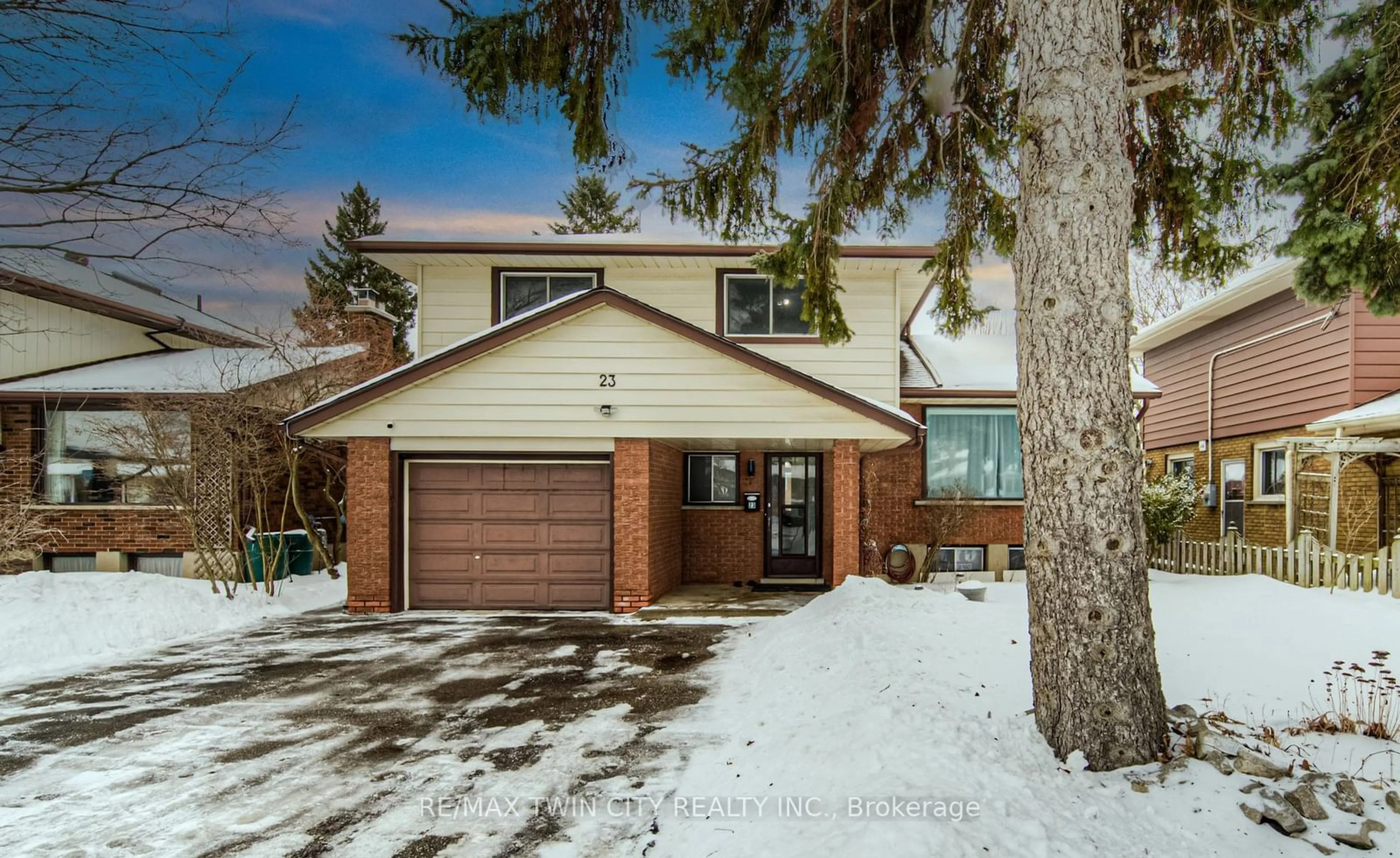 Home with brick exterior material, street for 23 Fairlawn Rd, Kitchener Ontario N2C 1X8