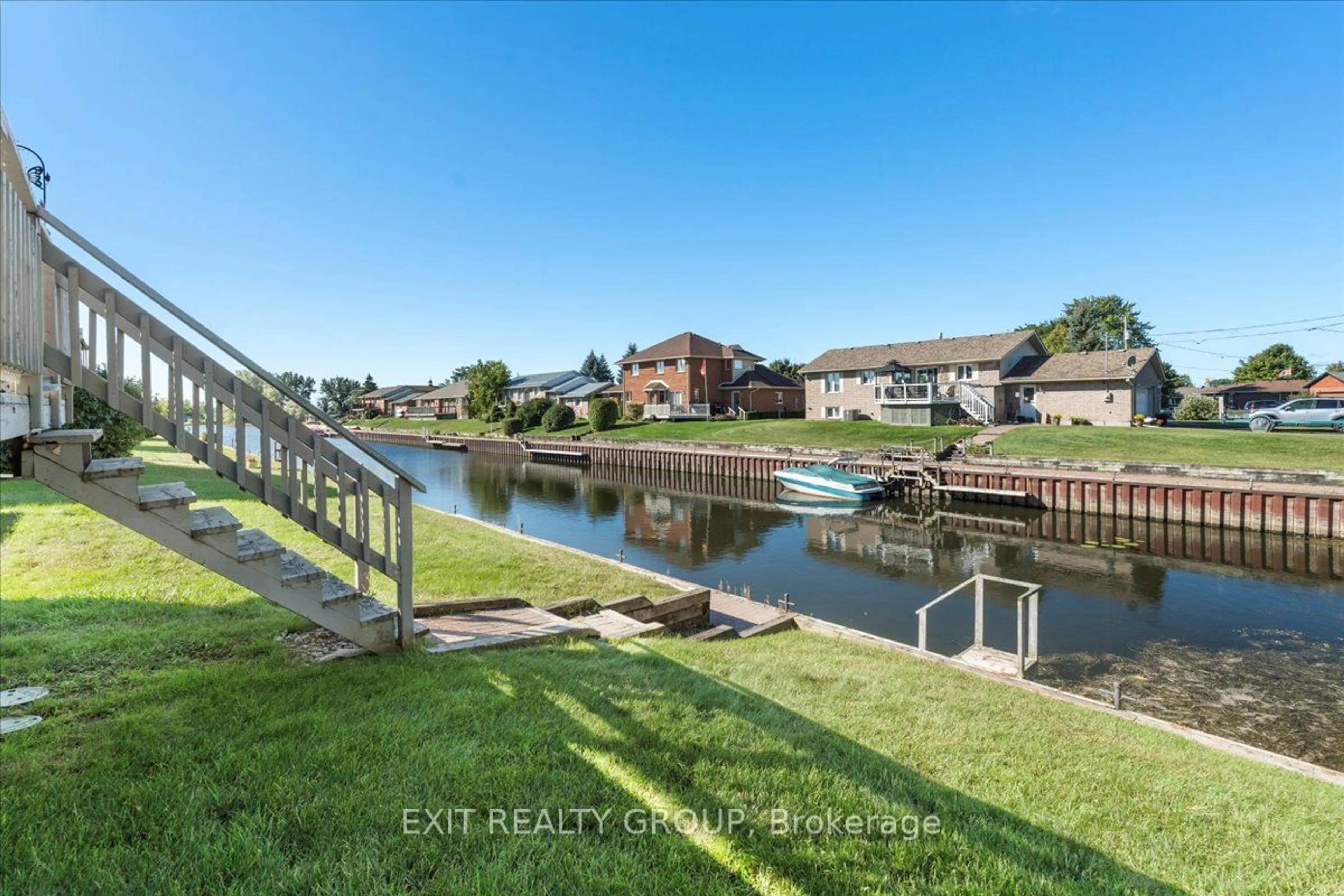 A pic from outside/outdoor area/front of a property/back of a property/a pic from drone, water/lake/river/ocean view for 2 Wendy's Lane, Brighton Ontario K0K 1H0