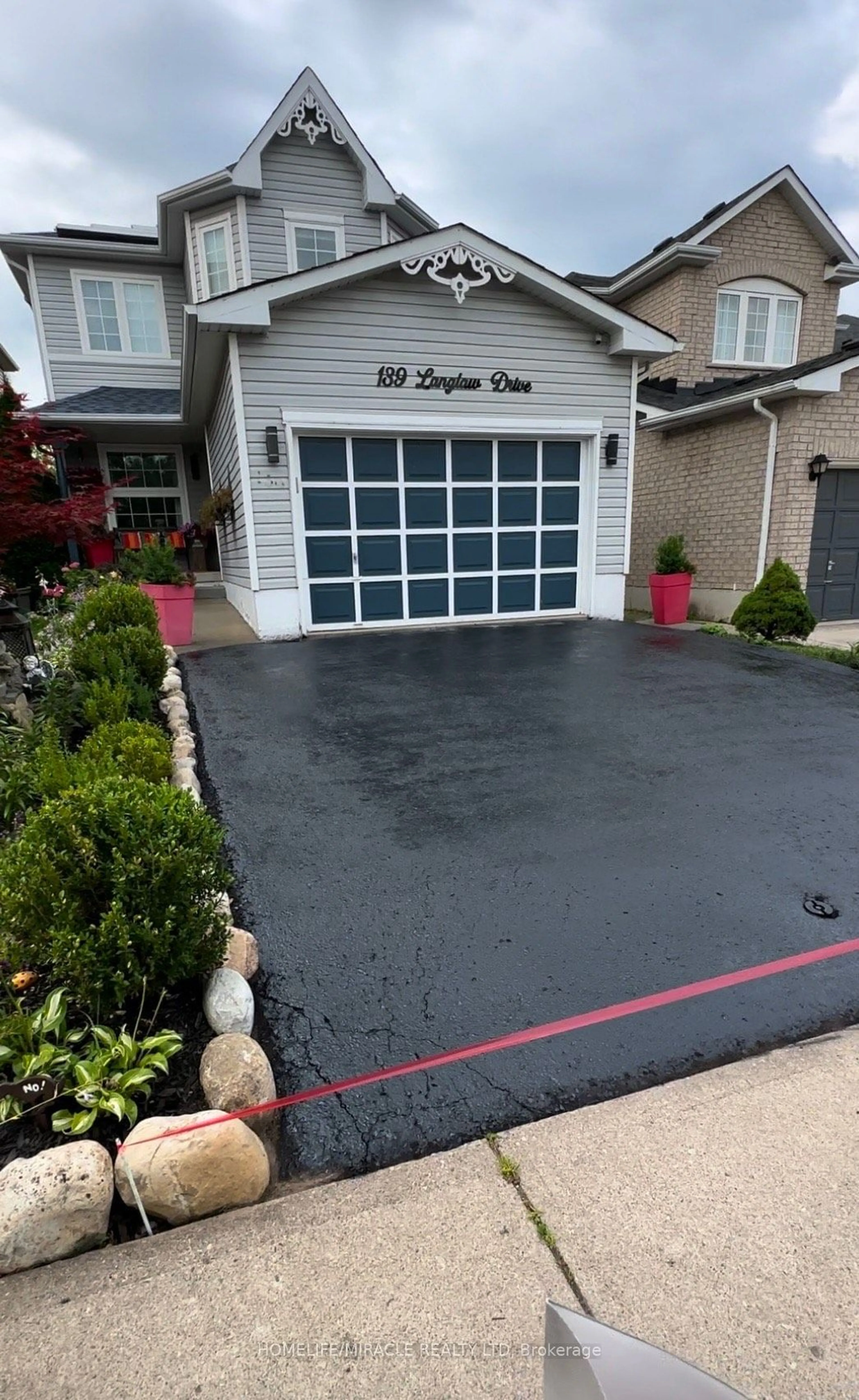 Home with vinyl exterior material, street for 139 Langlaw Dr, Cambridge Ontario N1P 1H9