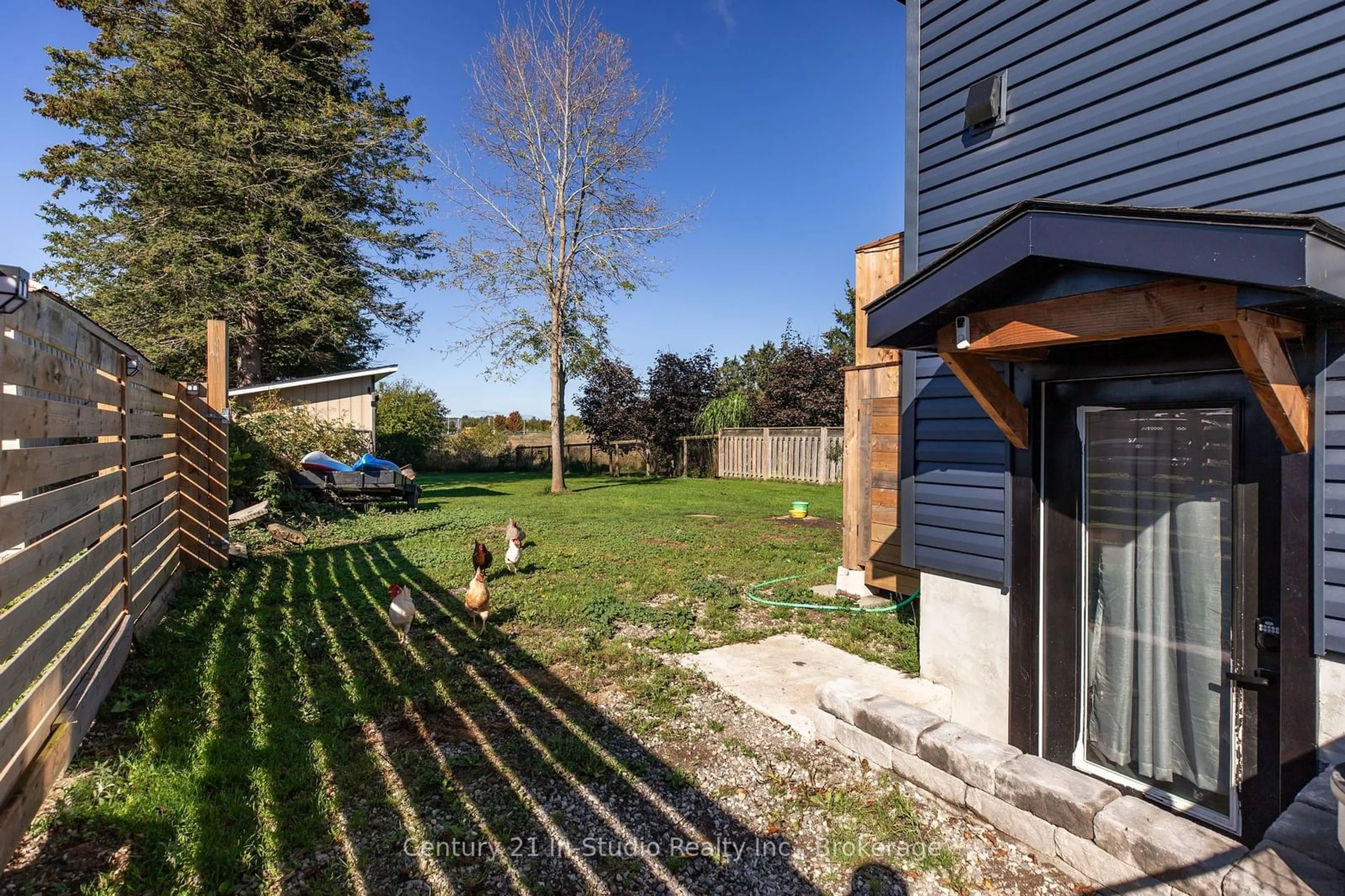 A pic from outside/outdoor area/front of a property/back of a property/a pic from drone, street for 496 Dawson St, South Bruce Peninsula Ontario N0H 2T0