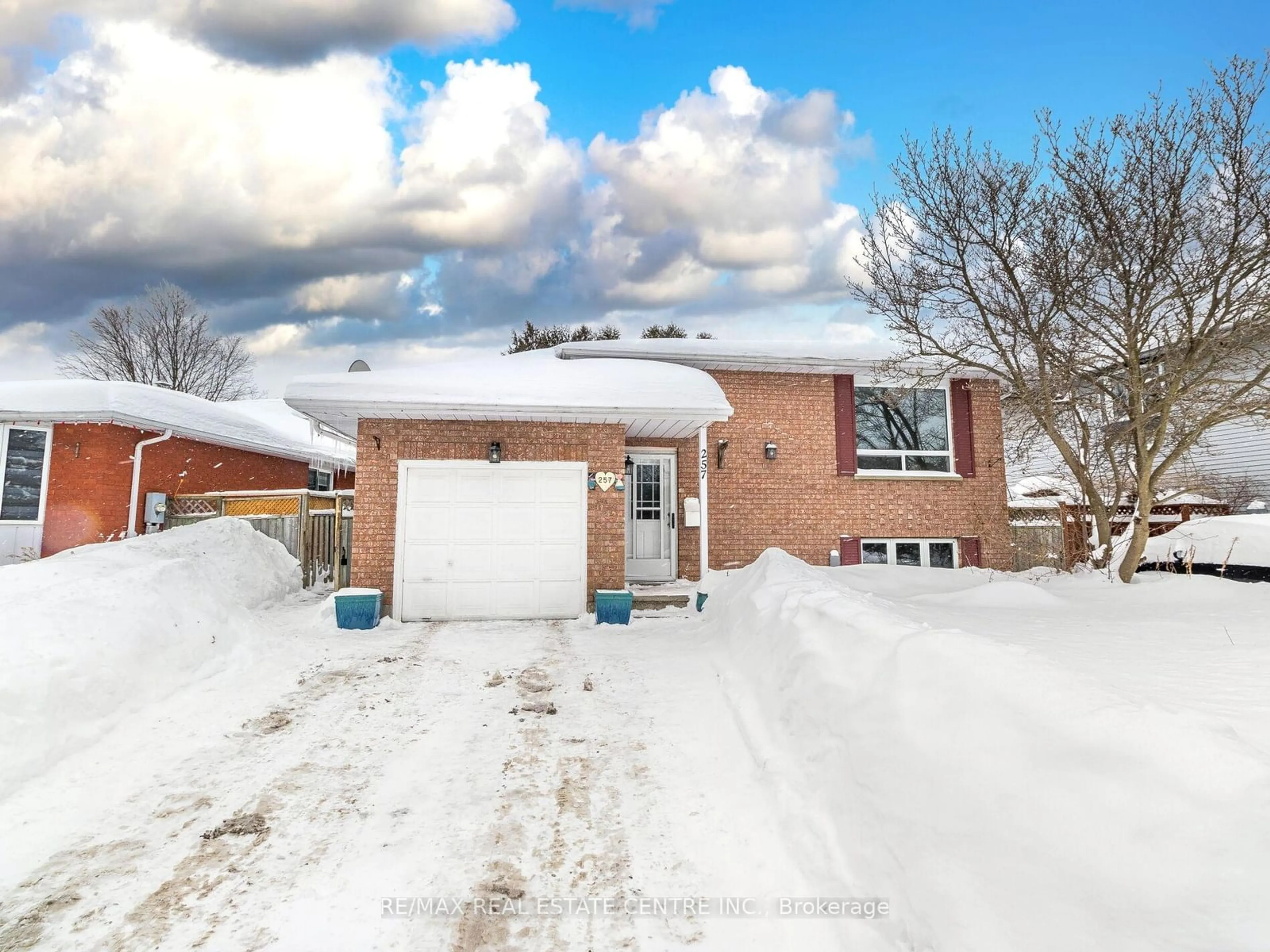 Home with brick exterior material, street for 257 Country Hill Dr, Kitchener Ontario N2E 2C1