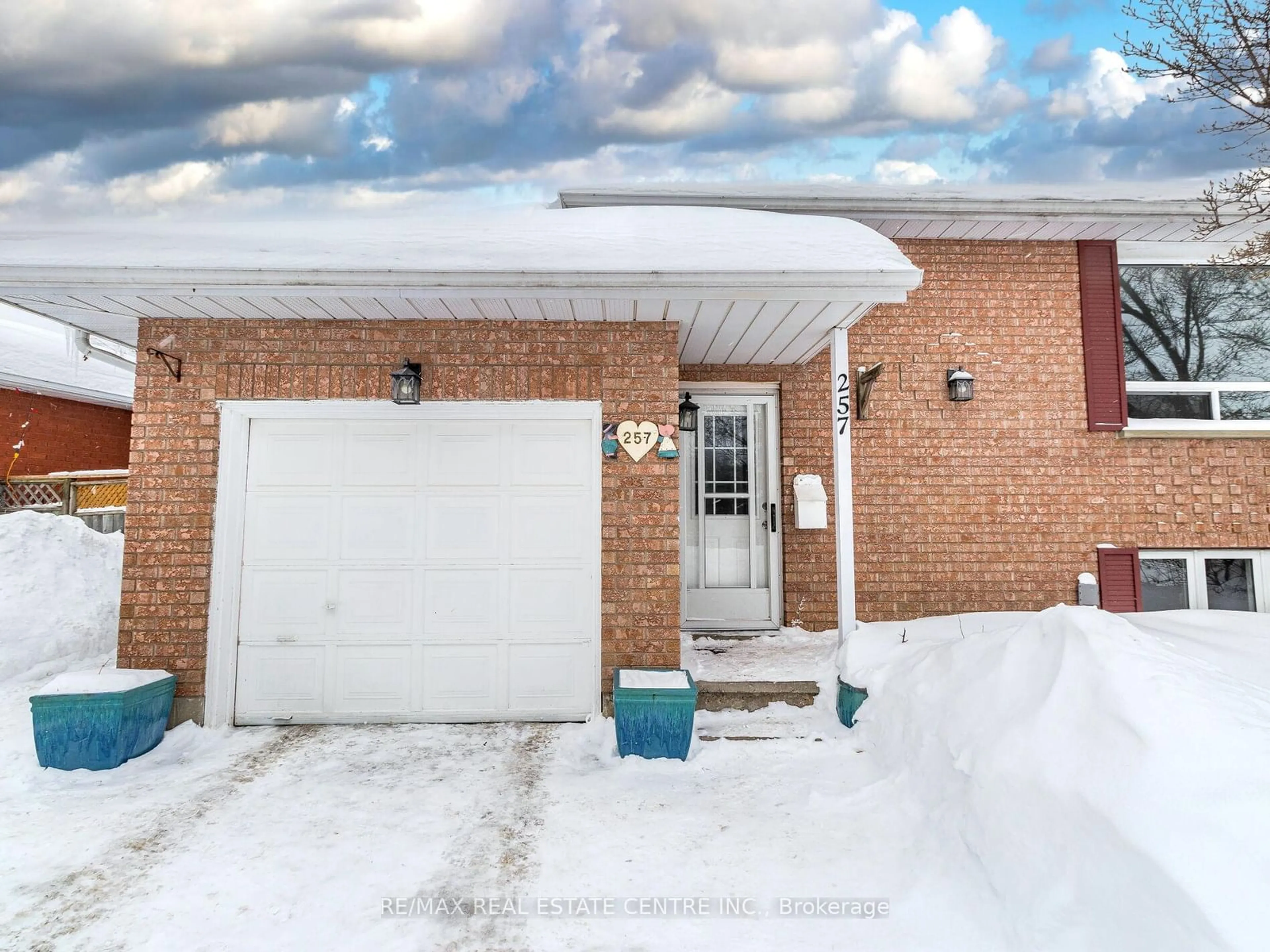 Home with brick exterior material, street for 257 Country Hill Dr, Kitchener Ontario N2E 2C1