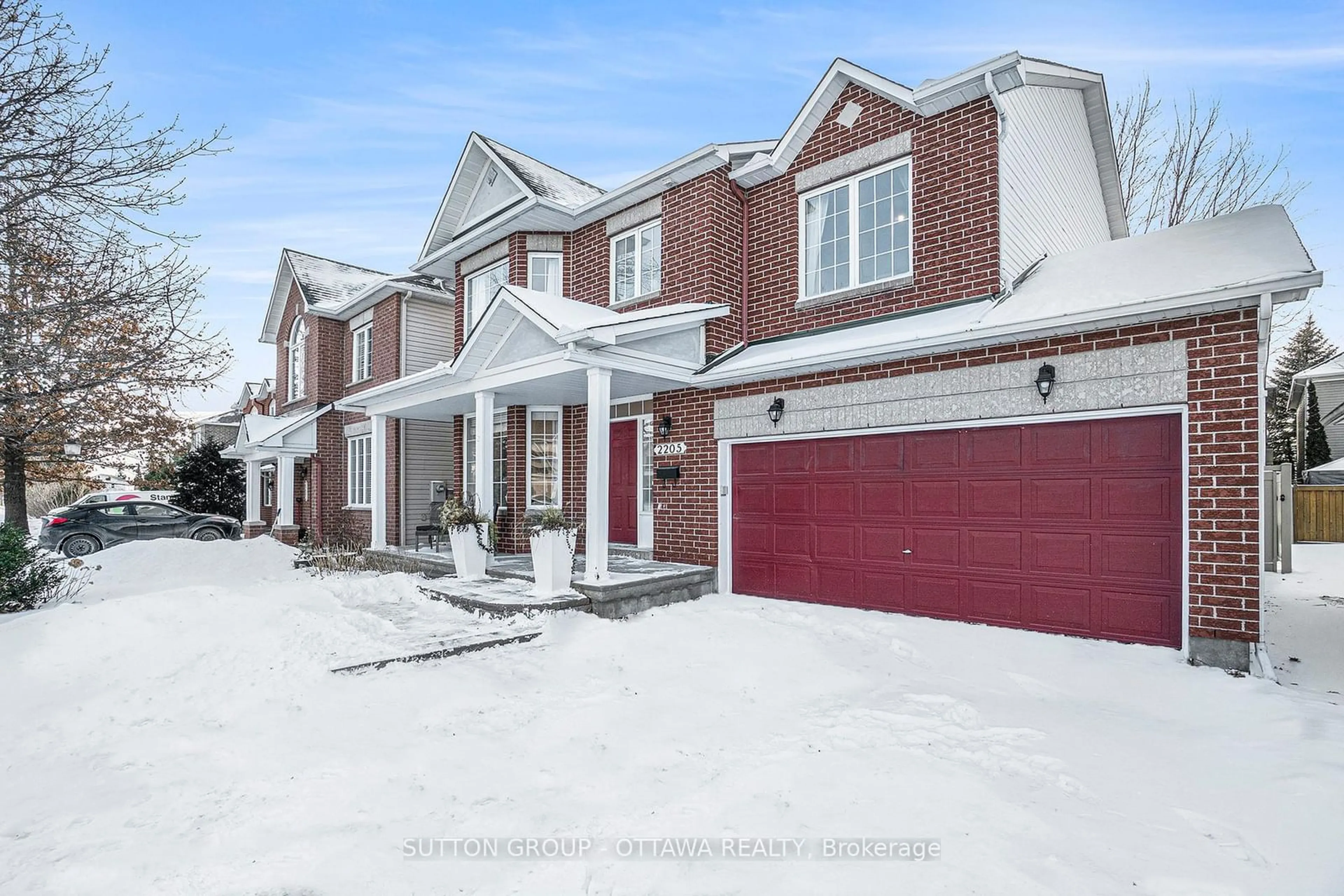 Home with brick exterior material, street for 2205 Blue Willow Cres, Orleans - Convent Glen and Area Ontario K1W 1K6