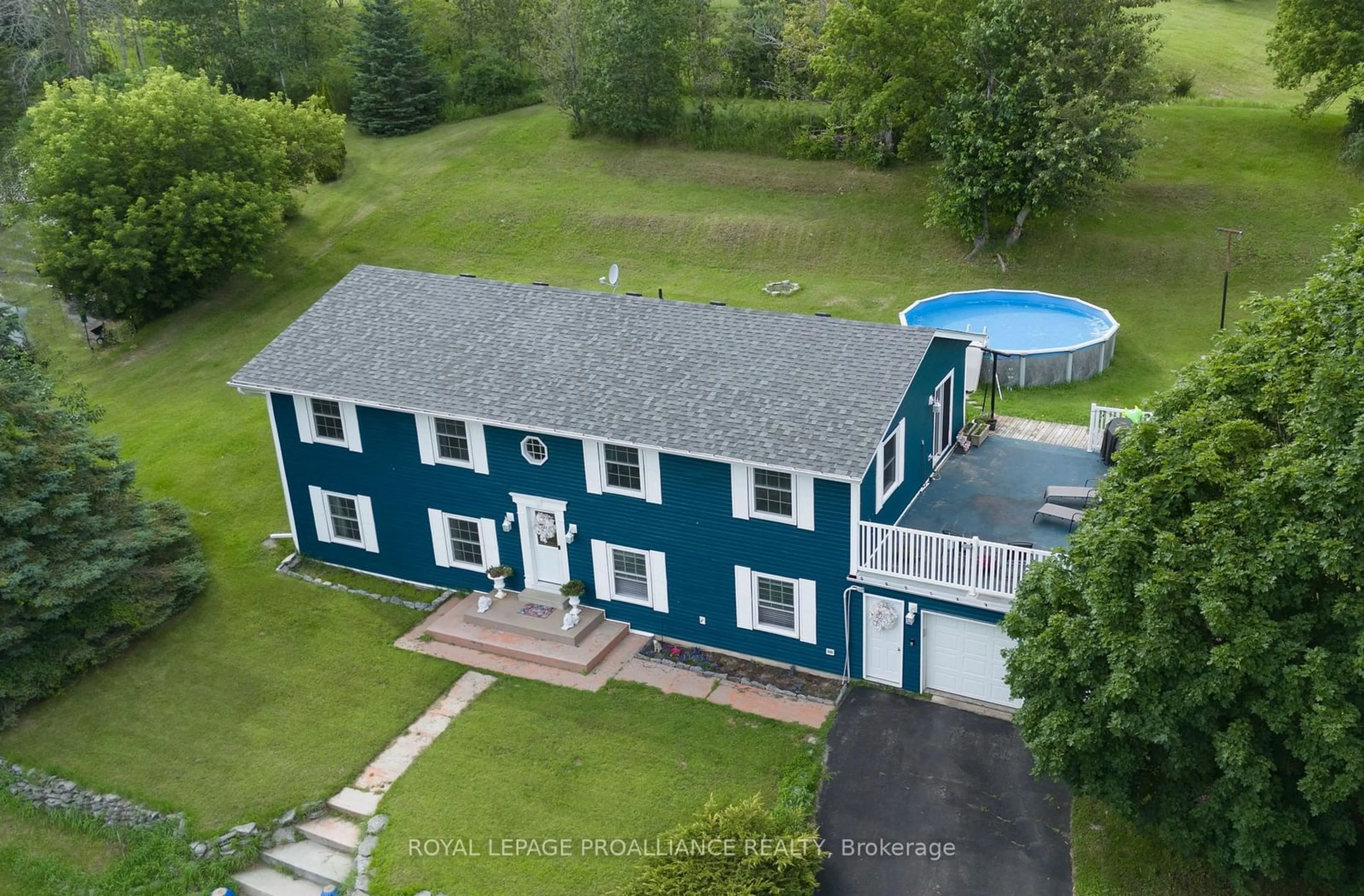 A pic from outside/outdoor area/front of a property/back of a property/a pic from drone, water/lake/river/ocean view for 1492 County Rd 5, Quinte West Ontario K0K 2C0