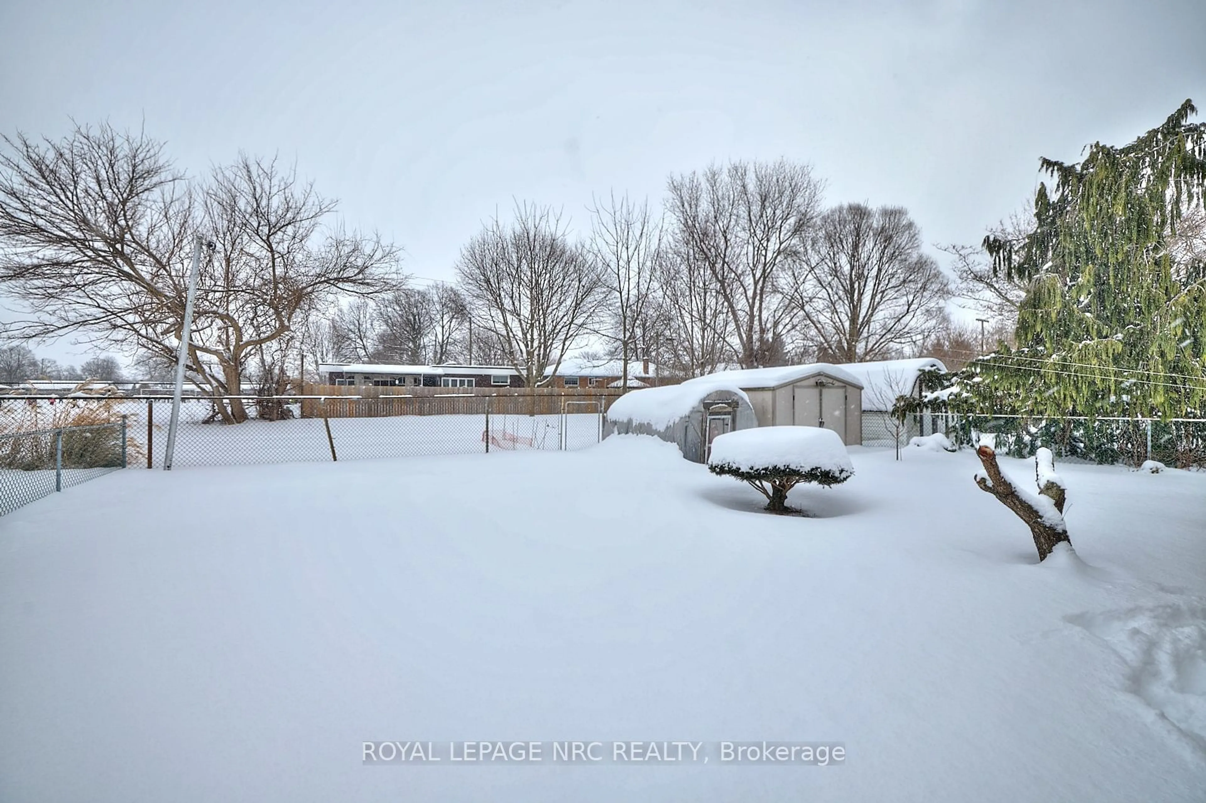 A pic from outside/outdoor area/front of a property/back of a property/a pic from drone, unknown for 63 Adel Dr, St. Catharines Ontario L2M 3W9