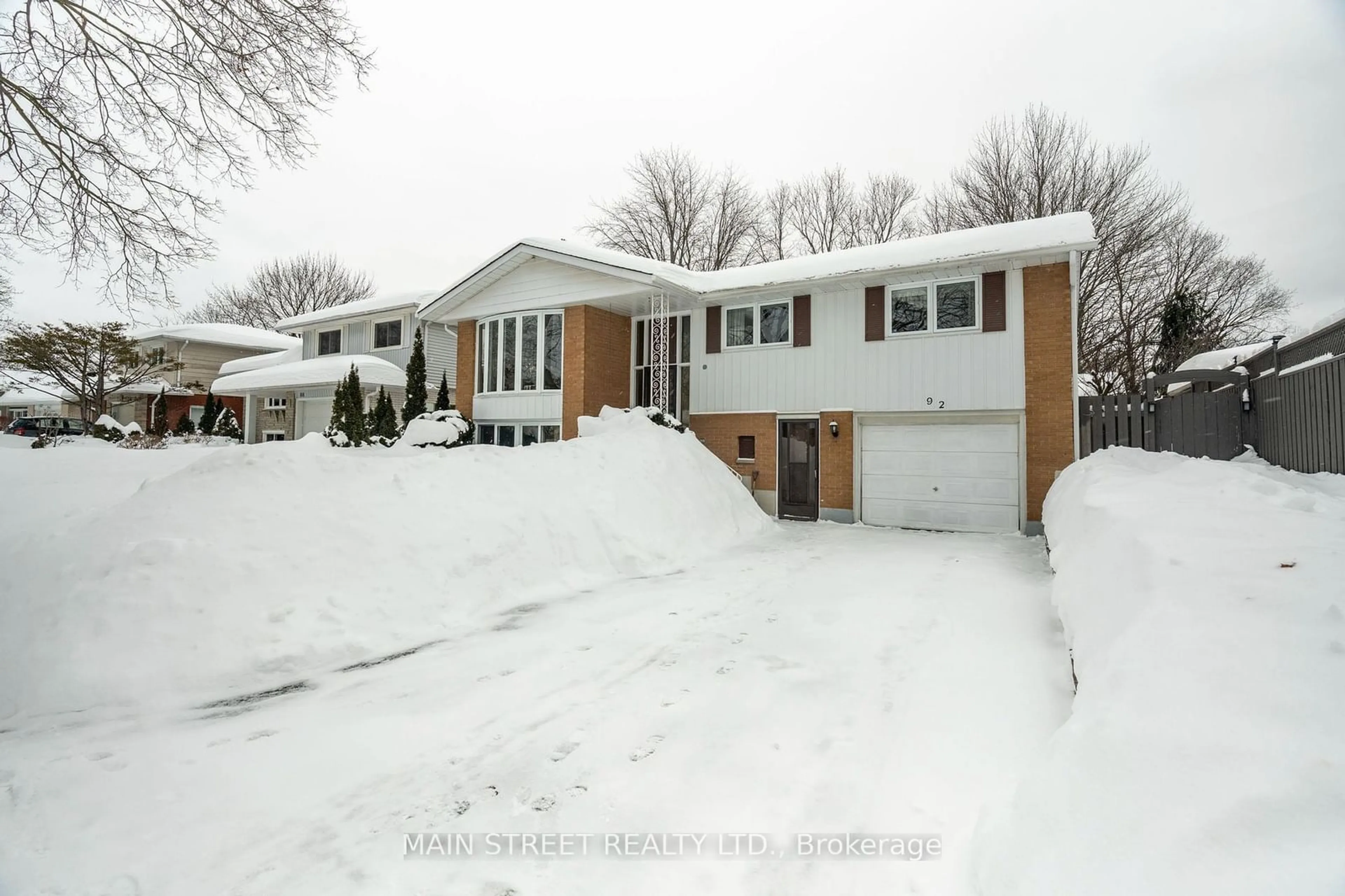 Home with vinyl exterior material, street for 92 Queenston Cres, Kitchener Ontario N2B 2V5