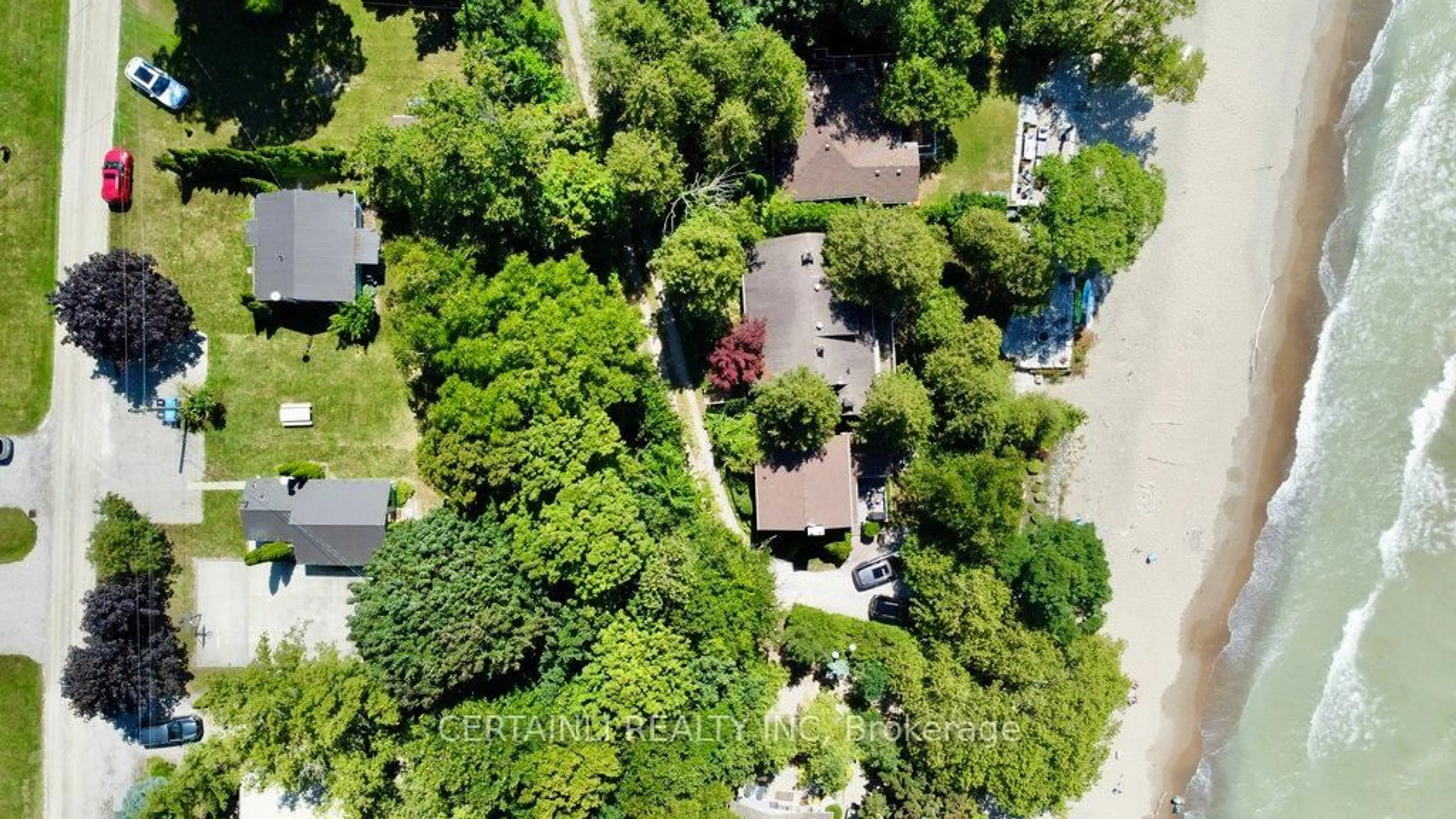 A pic from outside/outdoor area/front of a property/back of a property/a pic from drone, street for 73075 Ducharme Beach Rd, Bluewater Ontario N0M 2T0