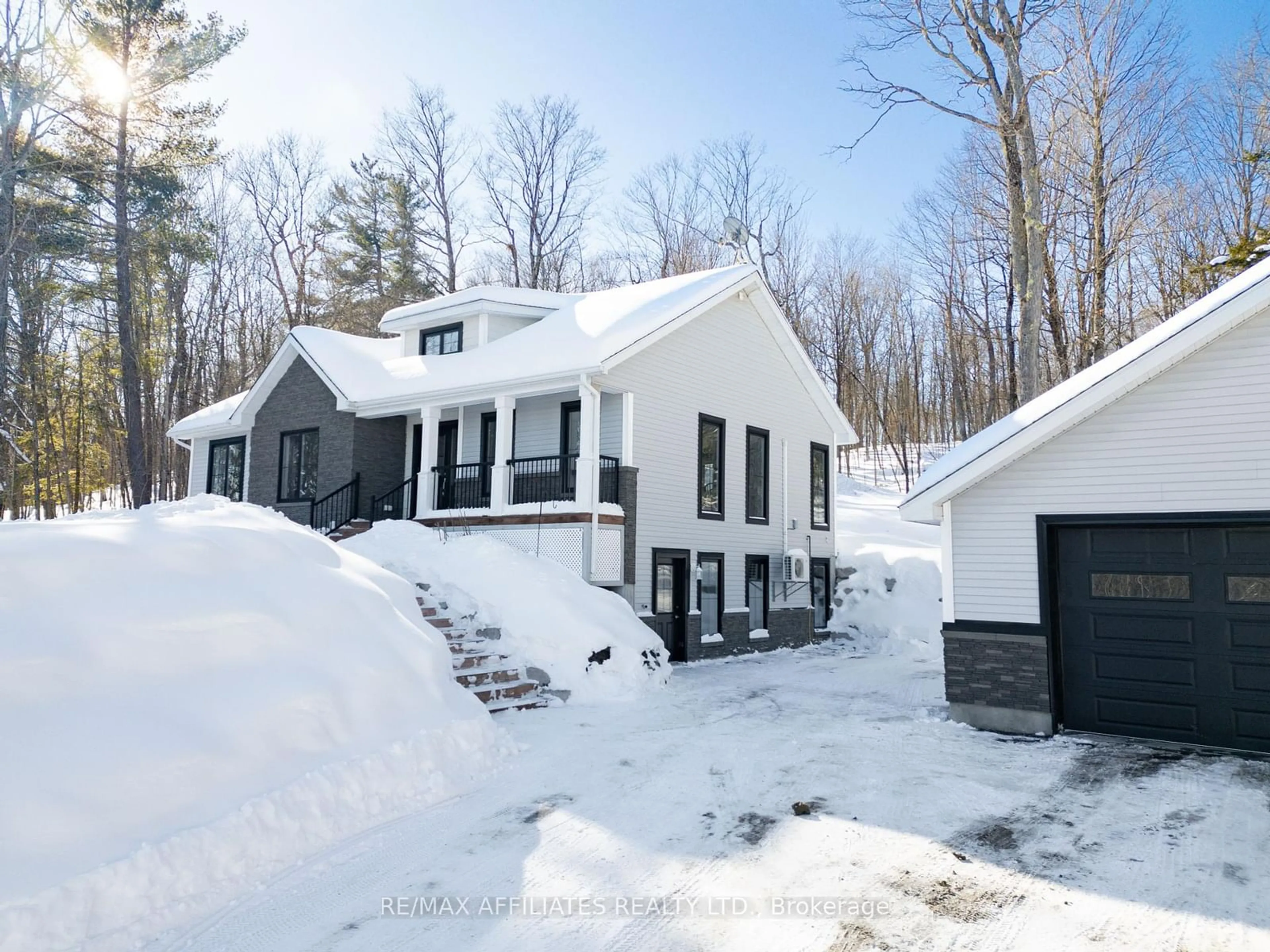 A pic from outside/outdoor area/front of a property/back of a property/a pic from drone, street for 174 Markle Rd, Lanark Highlands Ontario K0G 1K0