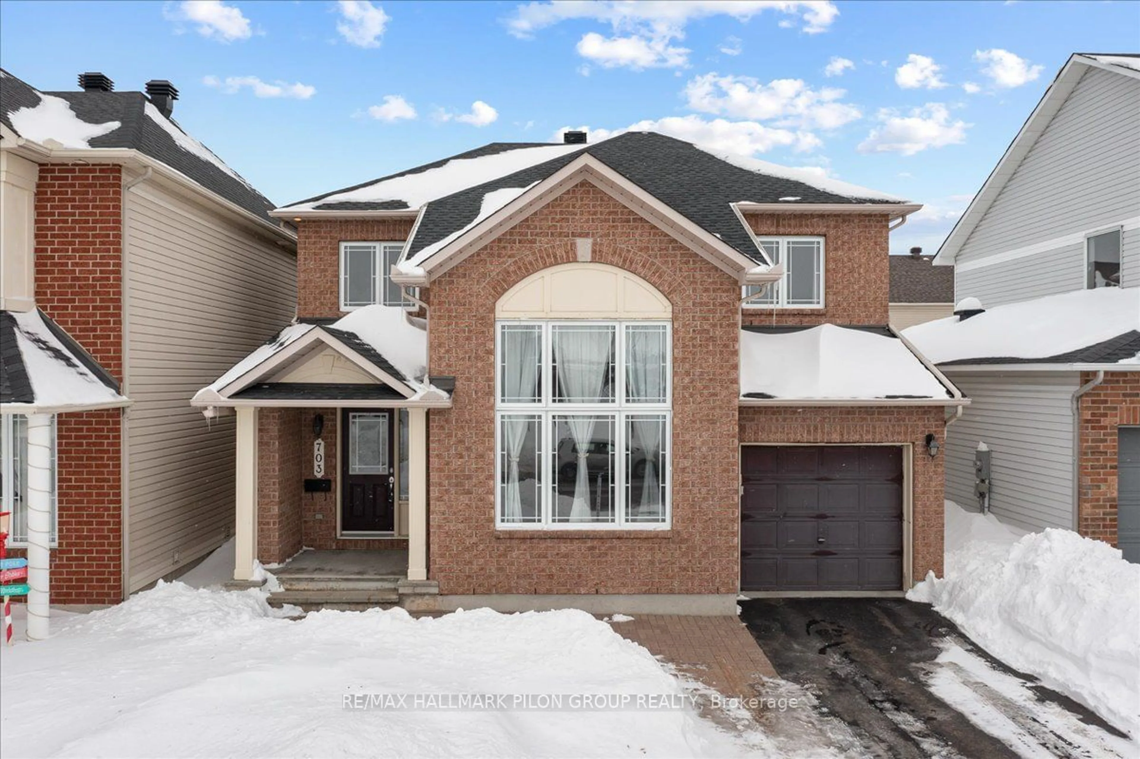 Home with brick exterior material, street for 703 Vistapark Dr, Orleans - Cumberland and Area Ontario K4A 0A2