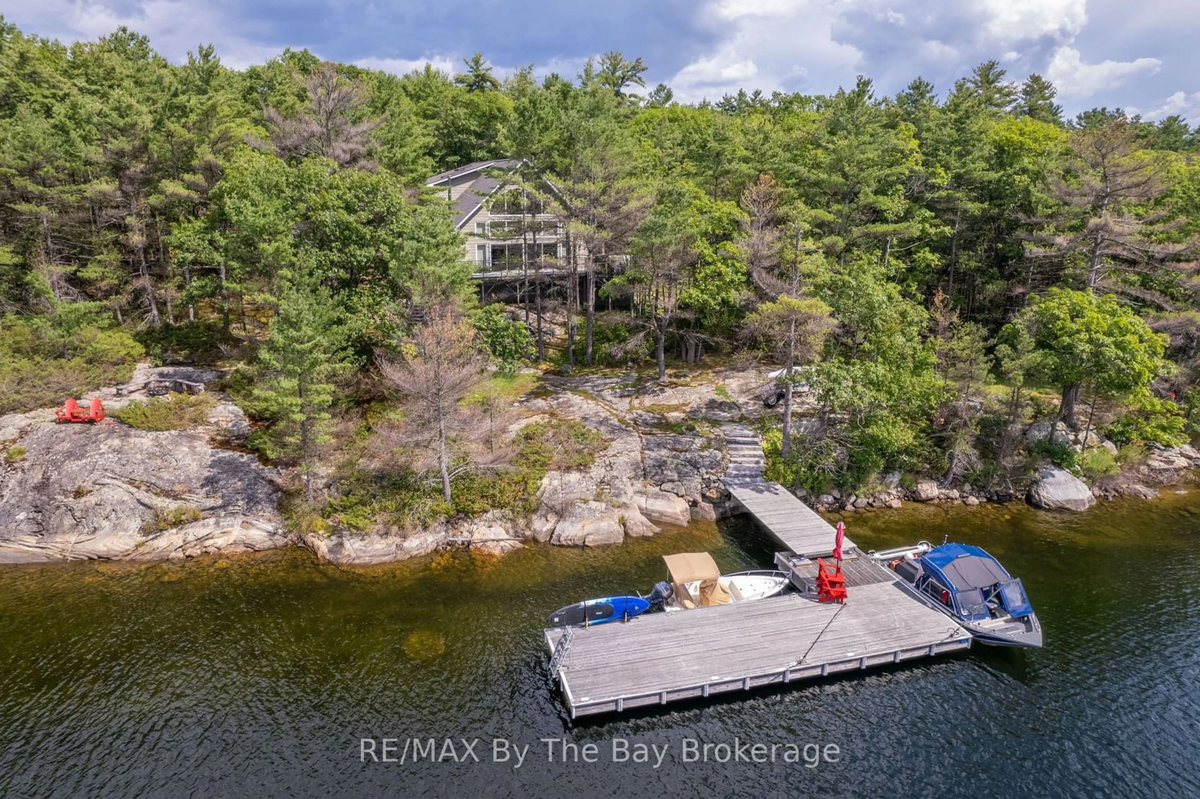 A pic from outside/outdoor area/front of a property/back of a property/a pic from drone, water/lake/river/ocean view for 17470 Georgian Bay Shore, Georgian Bay Ontario P0E 1E0