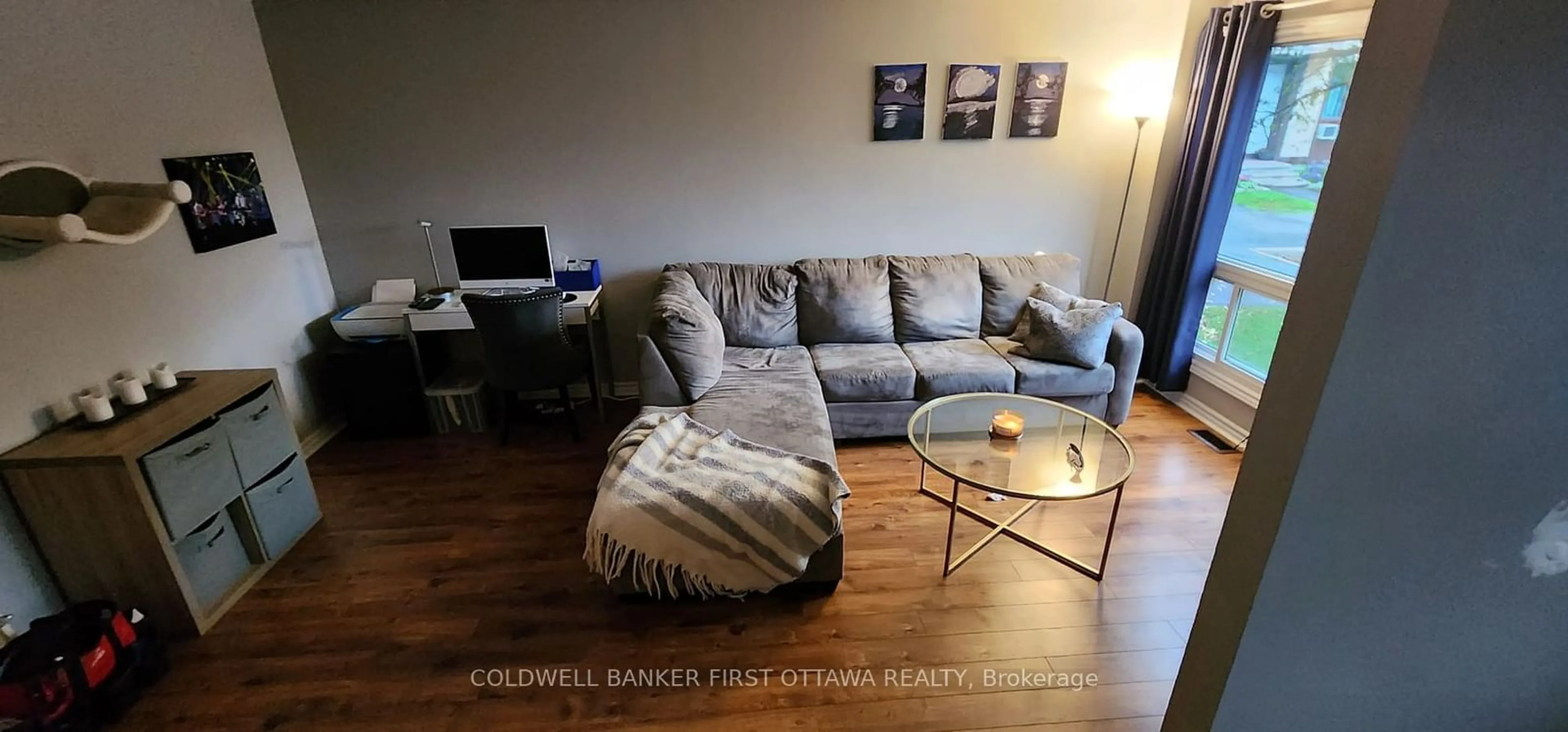 Living room with furniture, wood/laminate floor for 1218 Bethamy Lane #177, Beacon Hill North - South and Area Ontario K1J 8P4