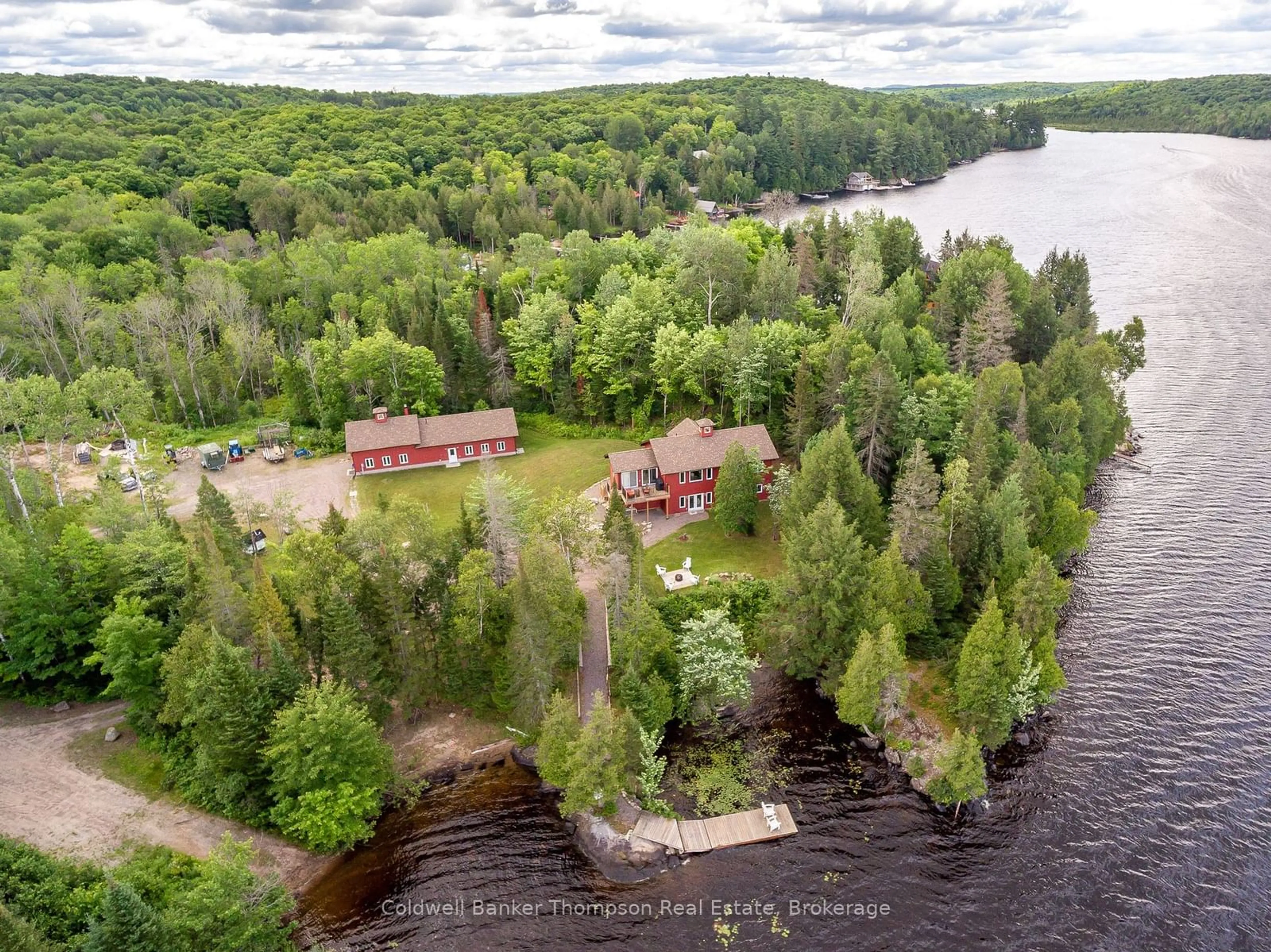 A pic from outside/outdoor area/front of a property/back of a property/a pic from drone, water/lake/river/ocean view for 35 Main Rd, Magnetawan Ontario P0A 1C0