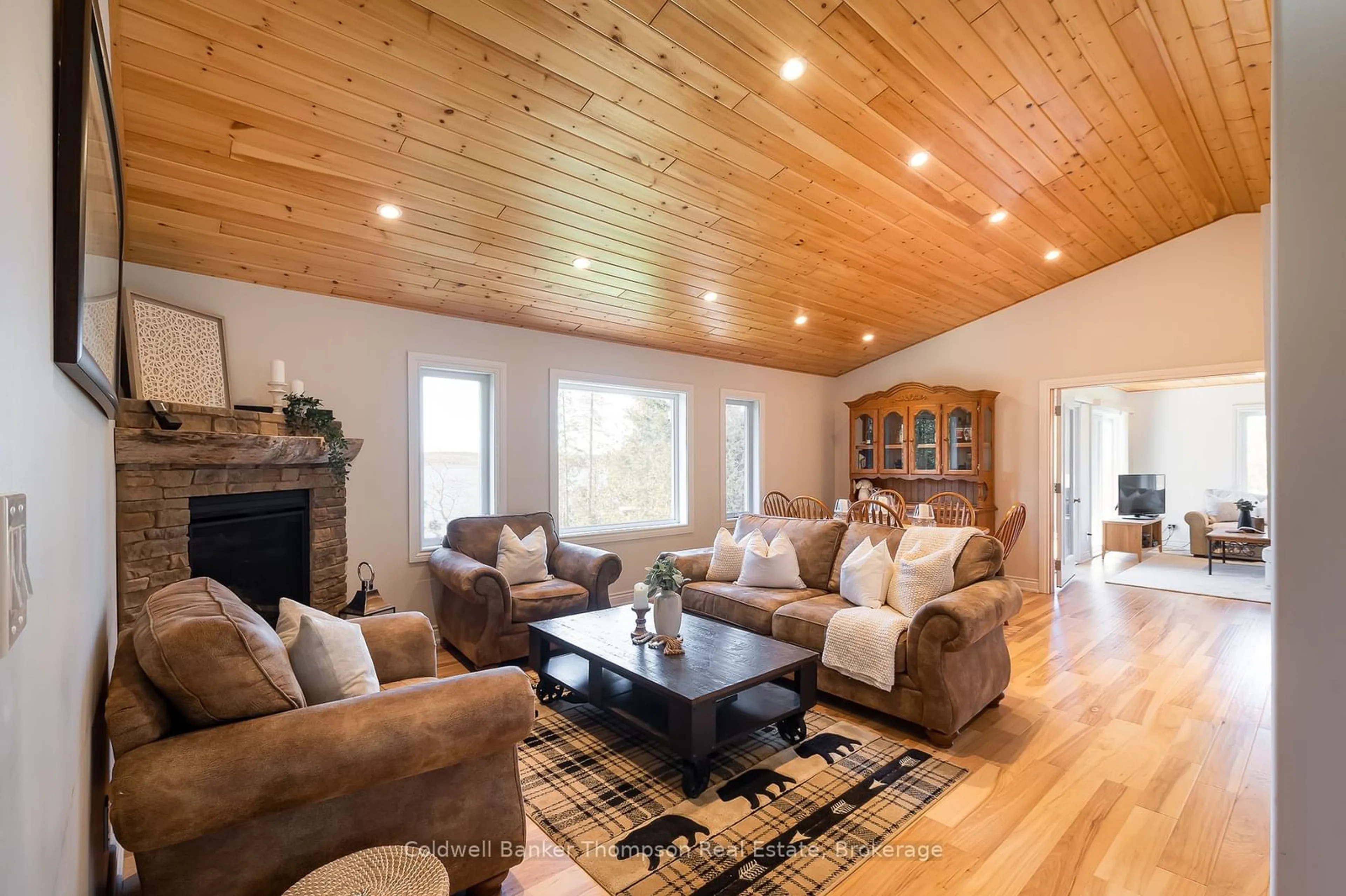 Living room with furniture, wood/laminate floor for 35 Main Rd, Magnetawan Ontario P0A 1C0