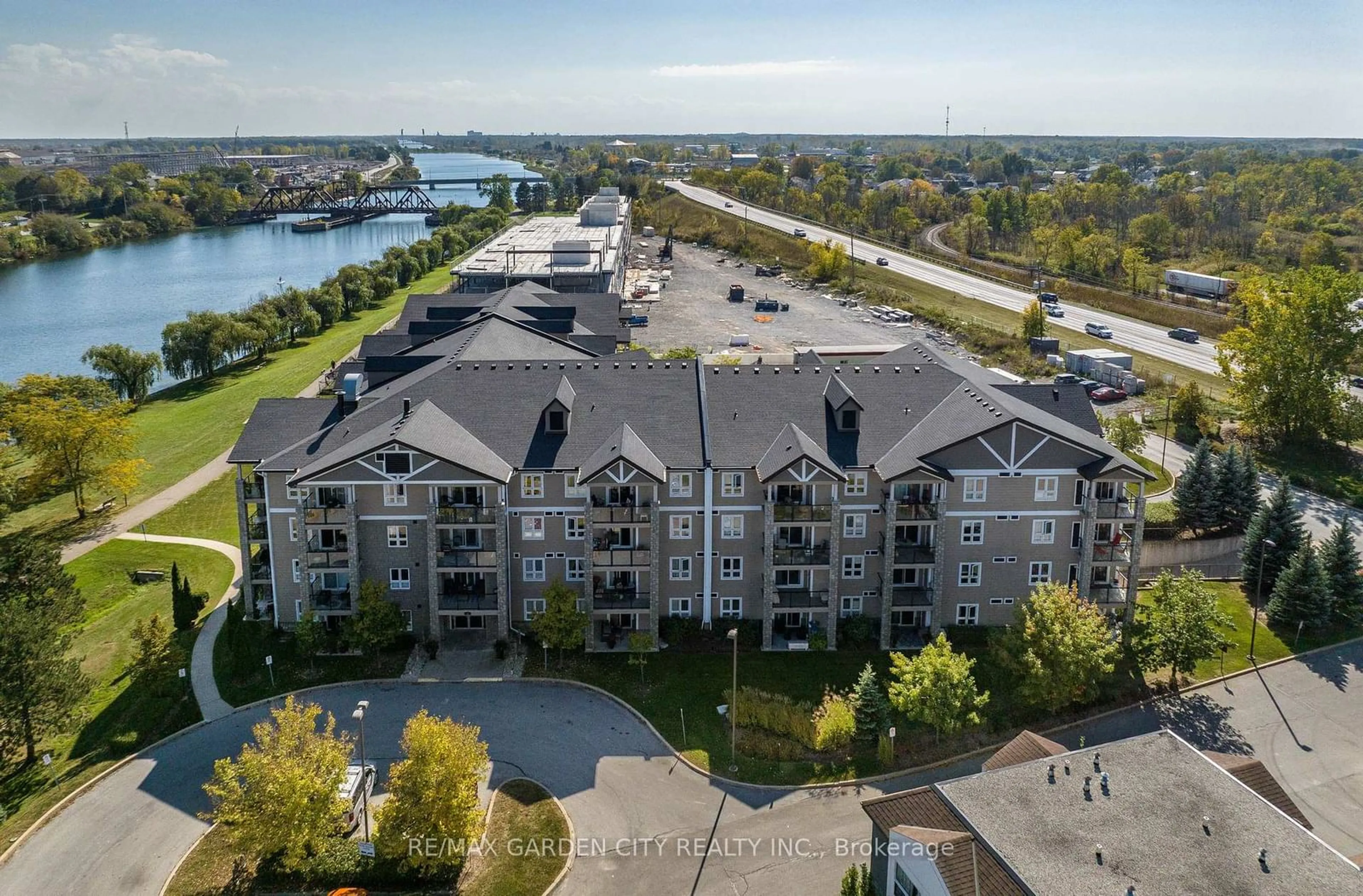 A pic from outside/outdoor area/front of a property/back of a property/a pic from drone, water/lake/river/ocean view for 330 PRINCE CHARLES Dr #1204, Welland Ontario L3C 7B3