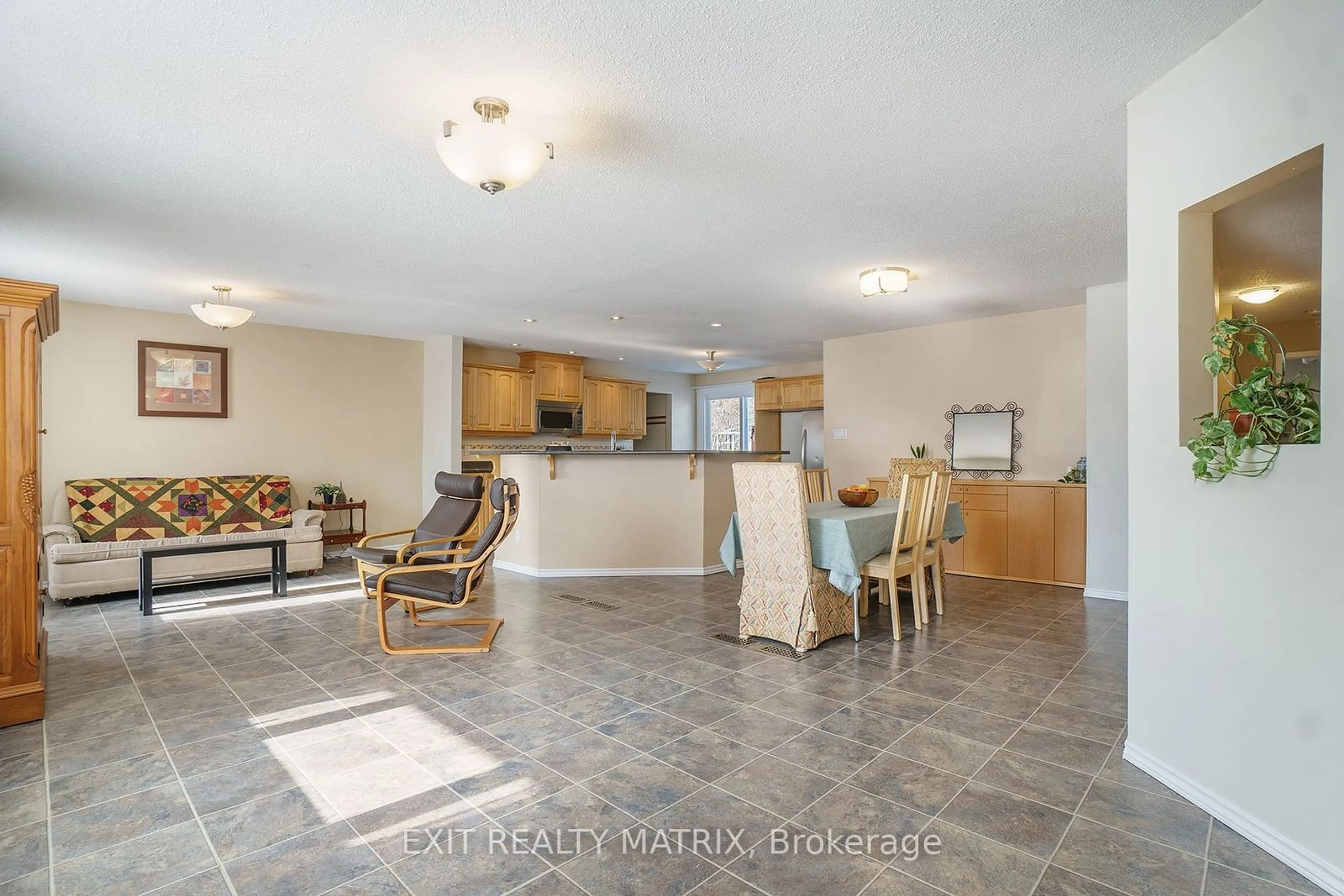 Living room with furniture, ceramic/tile floor for 73 George St, Russell Ontario K4R 1C2