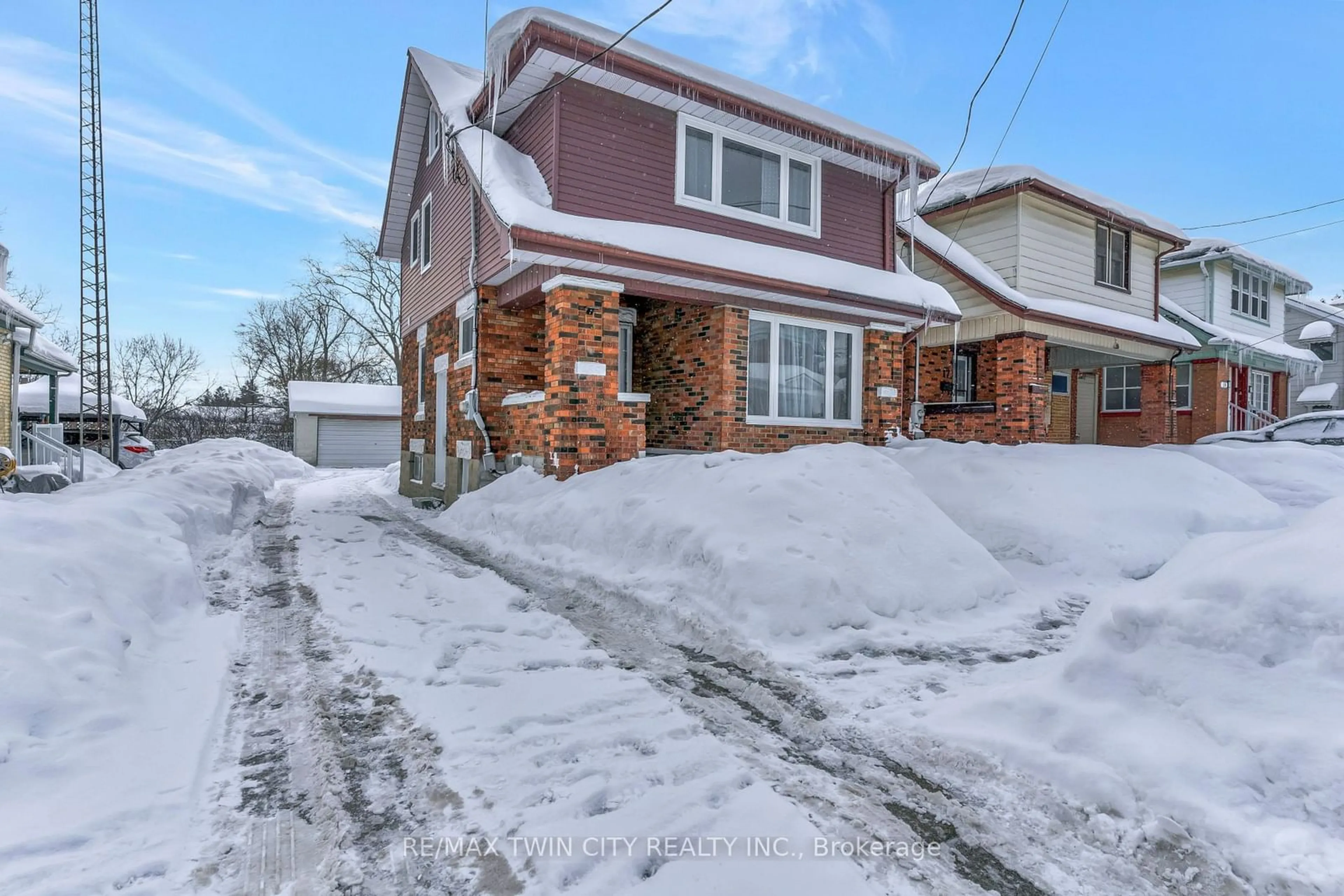 Home with brick exterior material, street for 15 Cherry St, Kitchener Ontario N2G 2C5