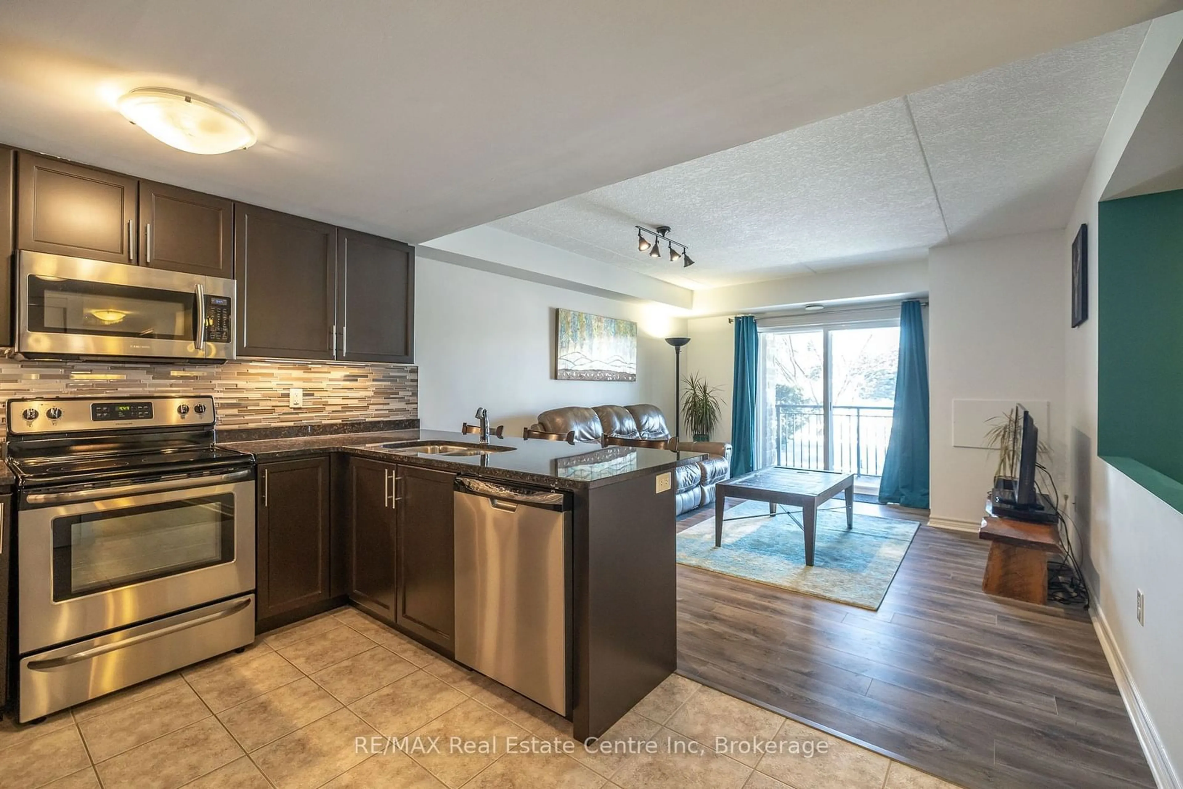 Open concept kitchen, unknown for 45 Kingsbury Sq #111, Guelph Ontario N1L 0L2