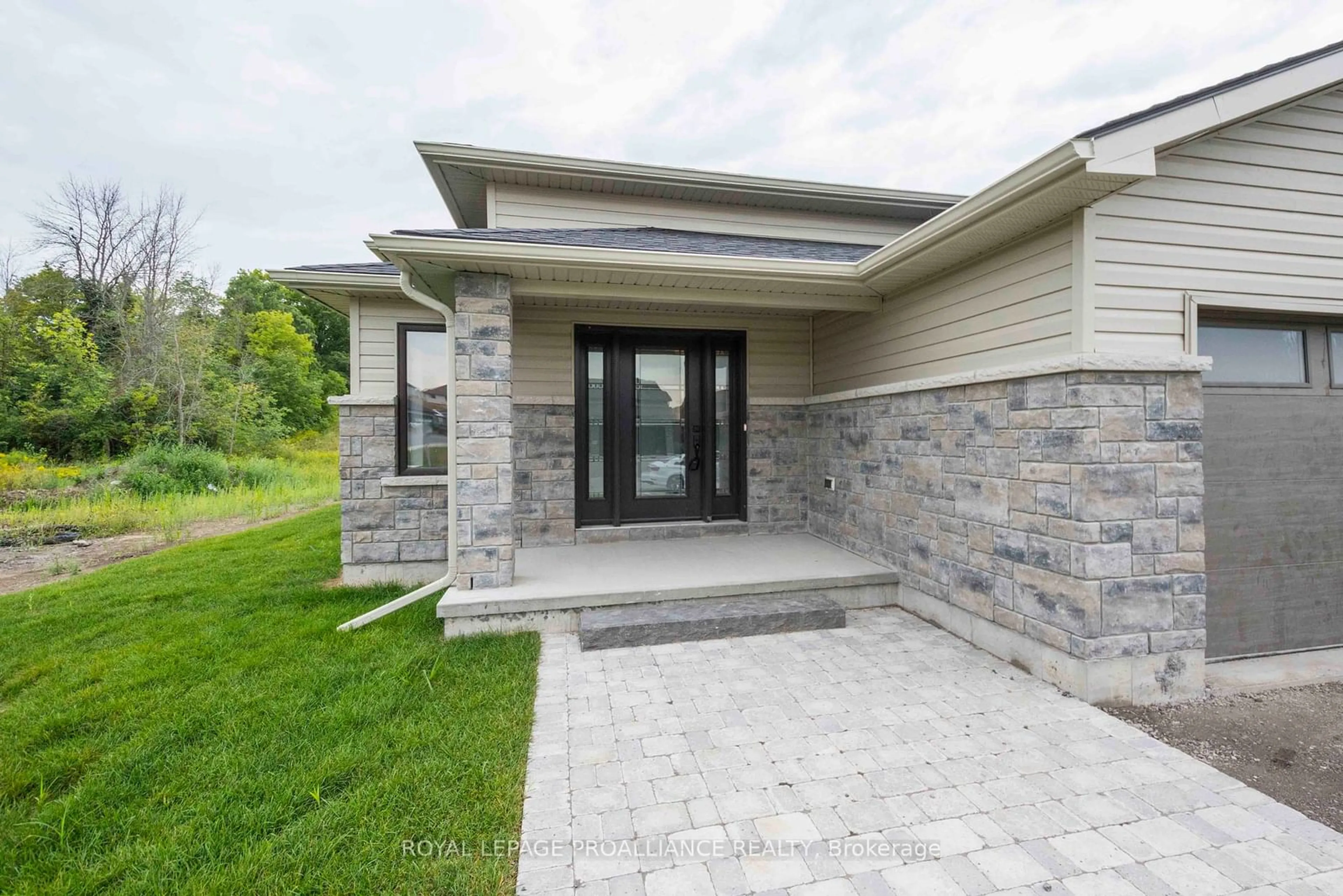 Home with brick exterior material, street for 77 Meagan Lane, Quinte West Ontario K0K 2C0