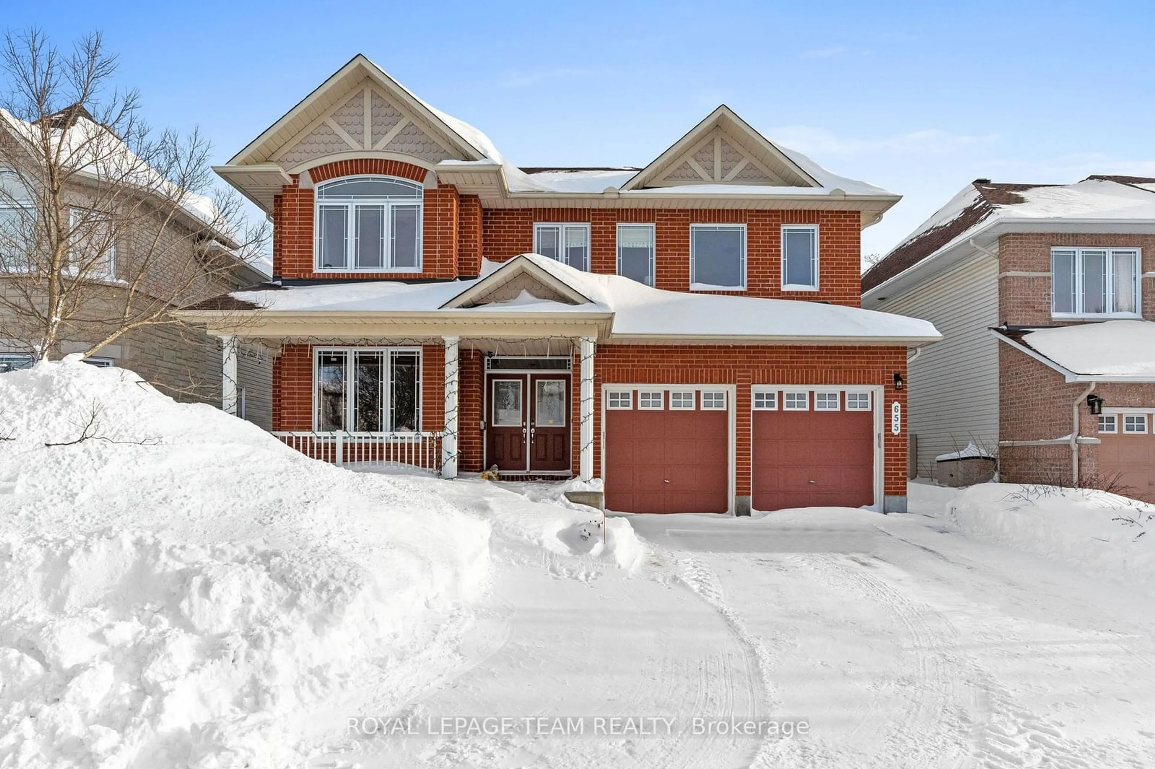 Home with brick exterior material, street for 655 New Liskeard Cres, Barrhaven Ontario K2J 0N3