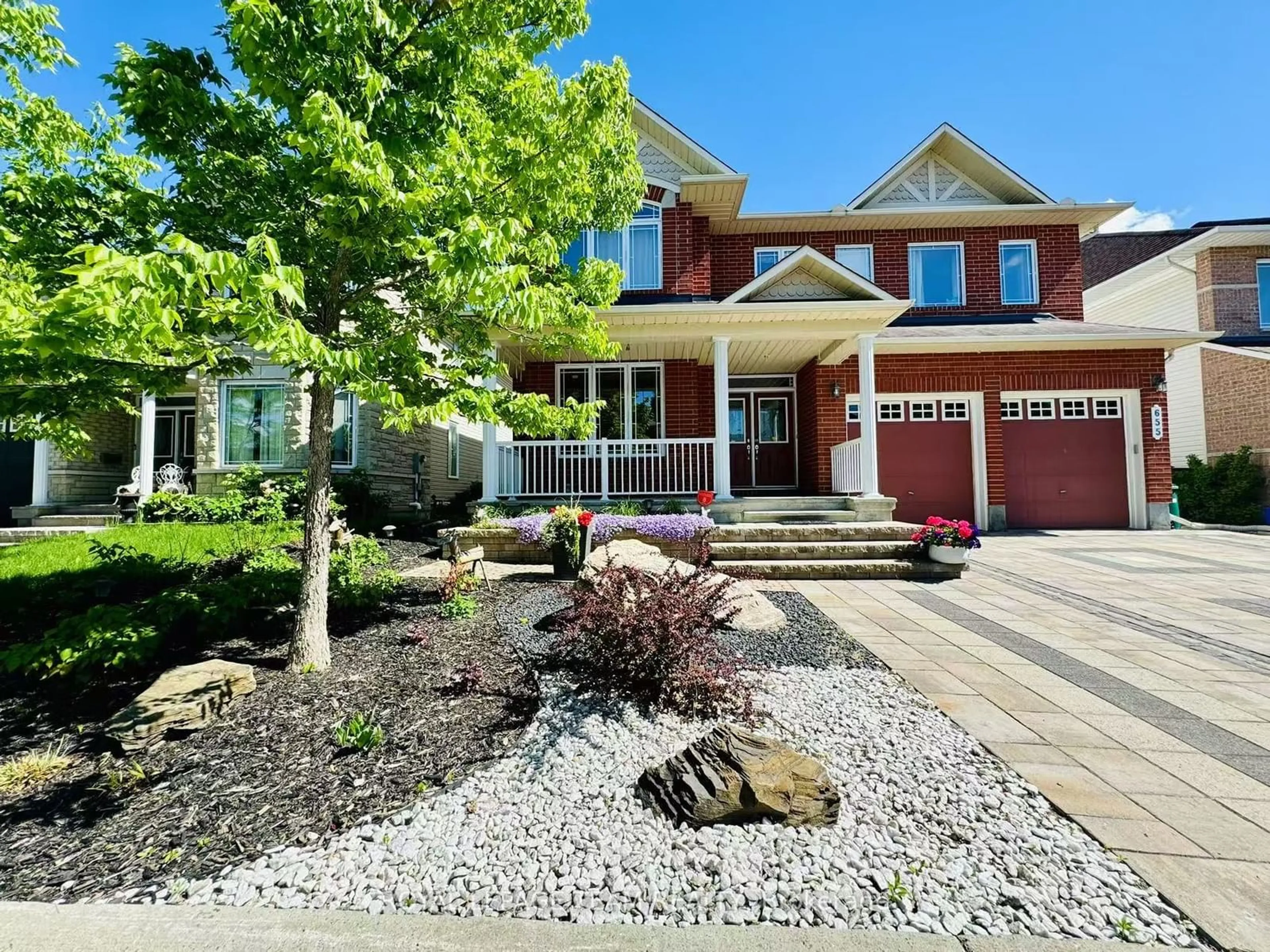 Home with brick exterior material, street for 655 New Liskeard Cres, Barrhaven Ontario K2J 0N3