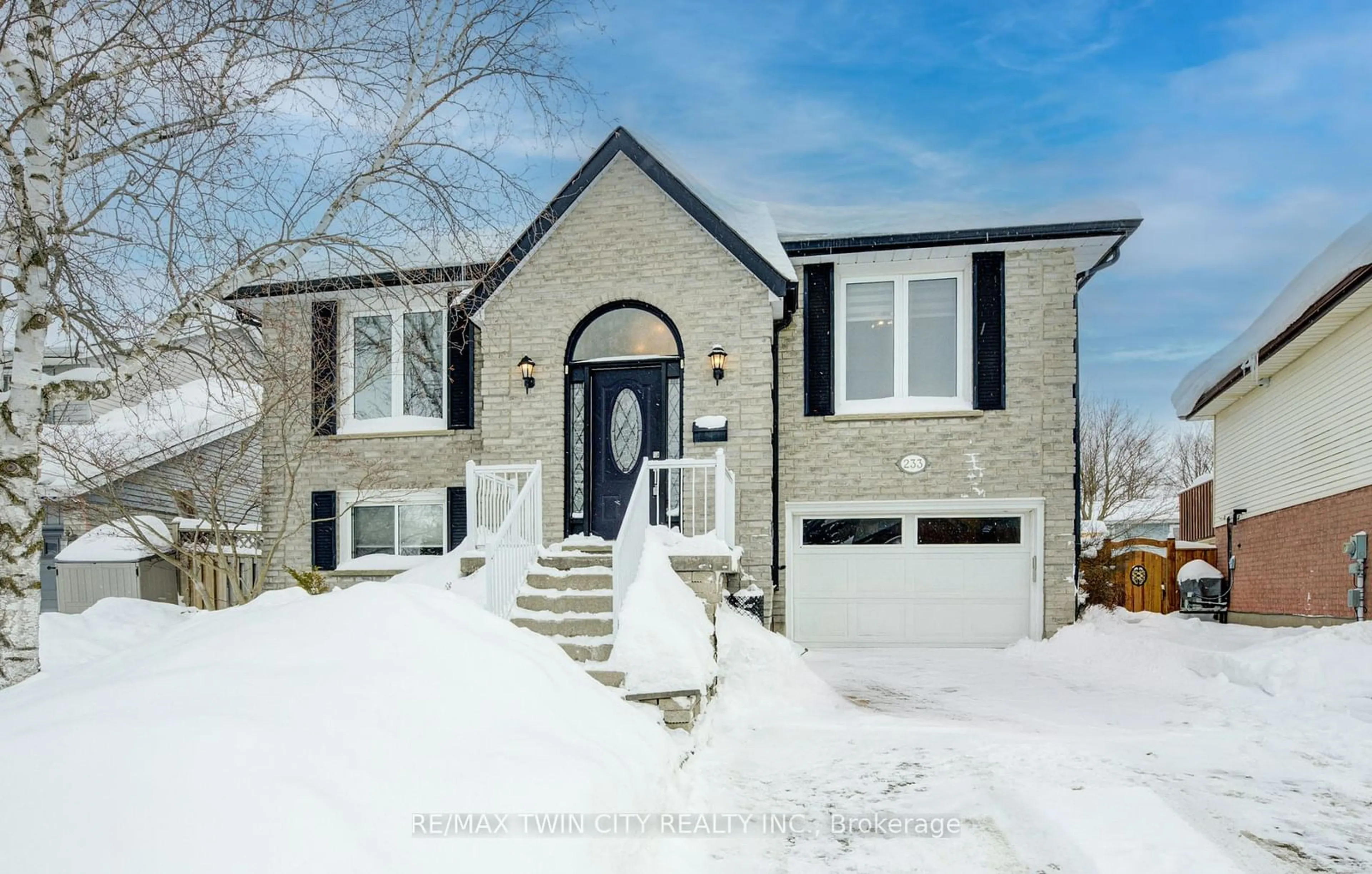 Home with brick exterior material, street for 233 Blackwell Dr, Kitchener Ontario N2N 2S6