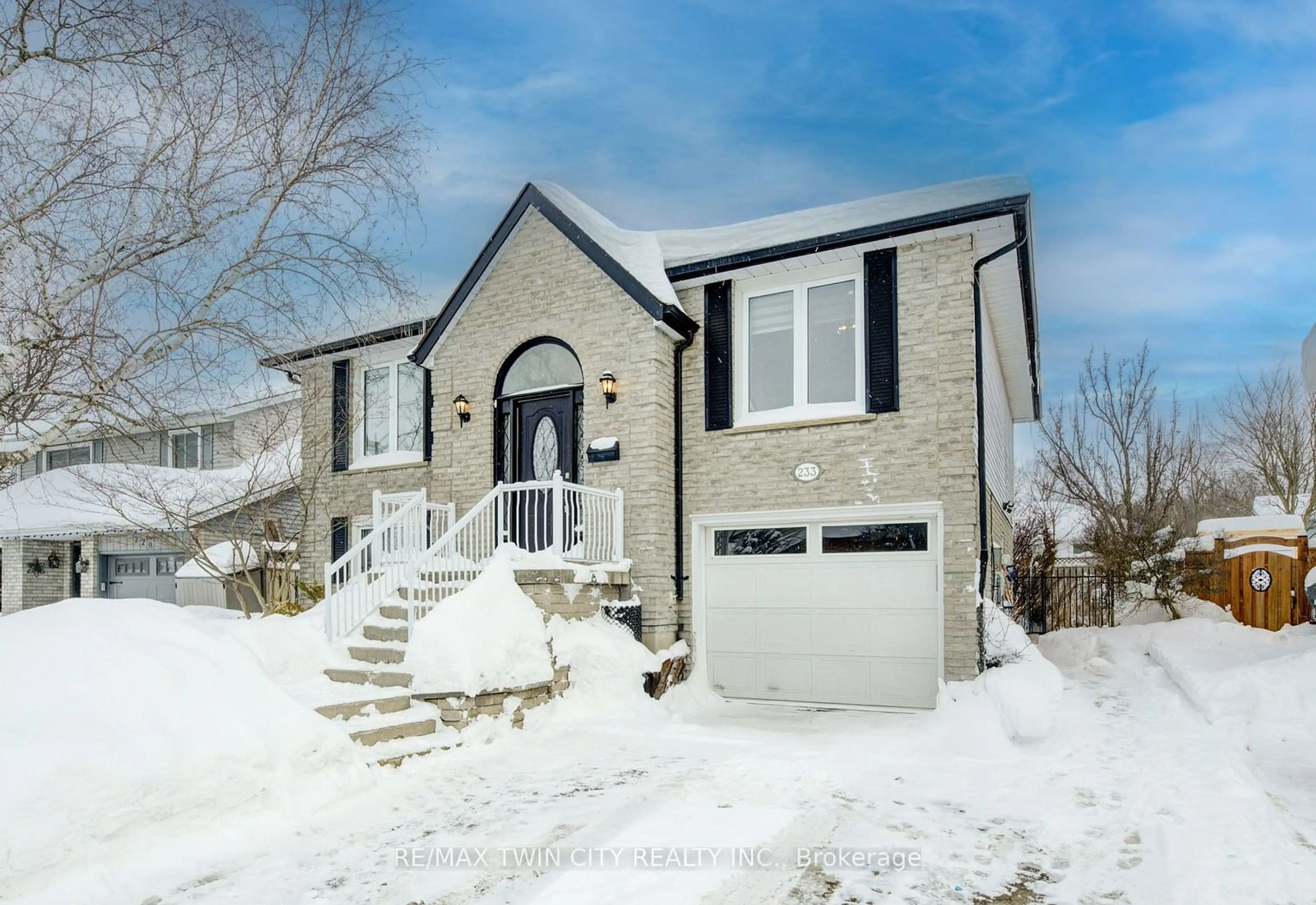 Home with brick exterior material, street for 233 Blackwell Dr, Kitchener Ontario N2N 2S6