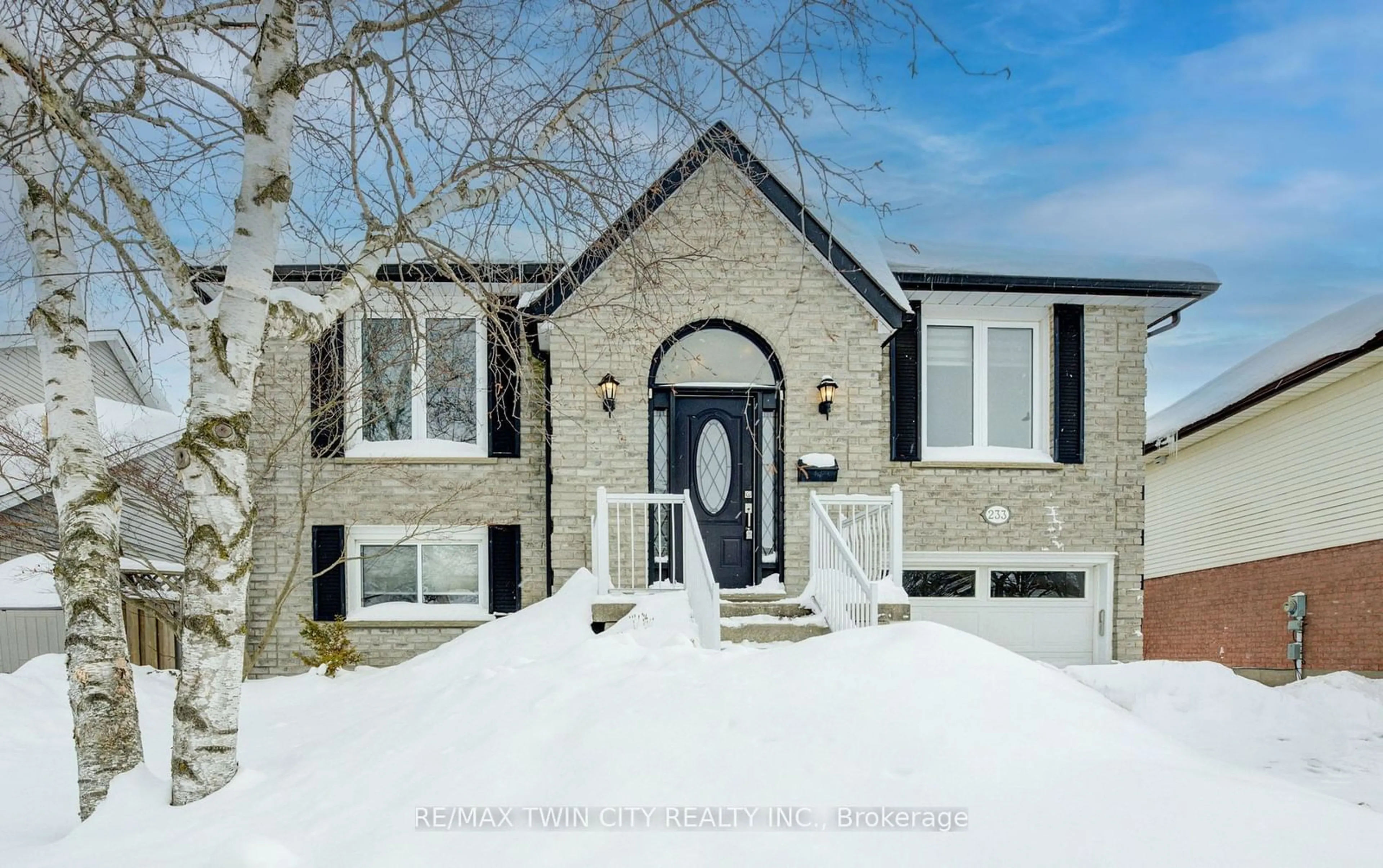 Home with brick exterior material, street for 233 Blackwell Dr, Kitchener Ontario N2N 2S6