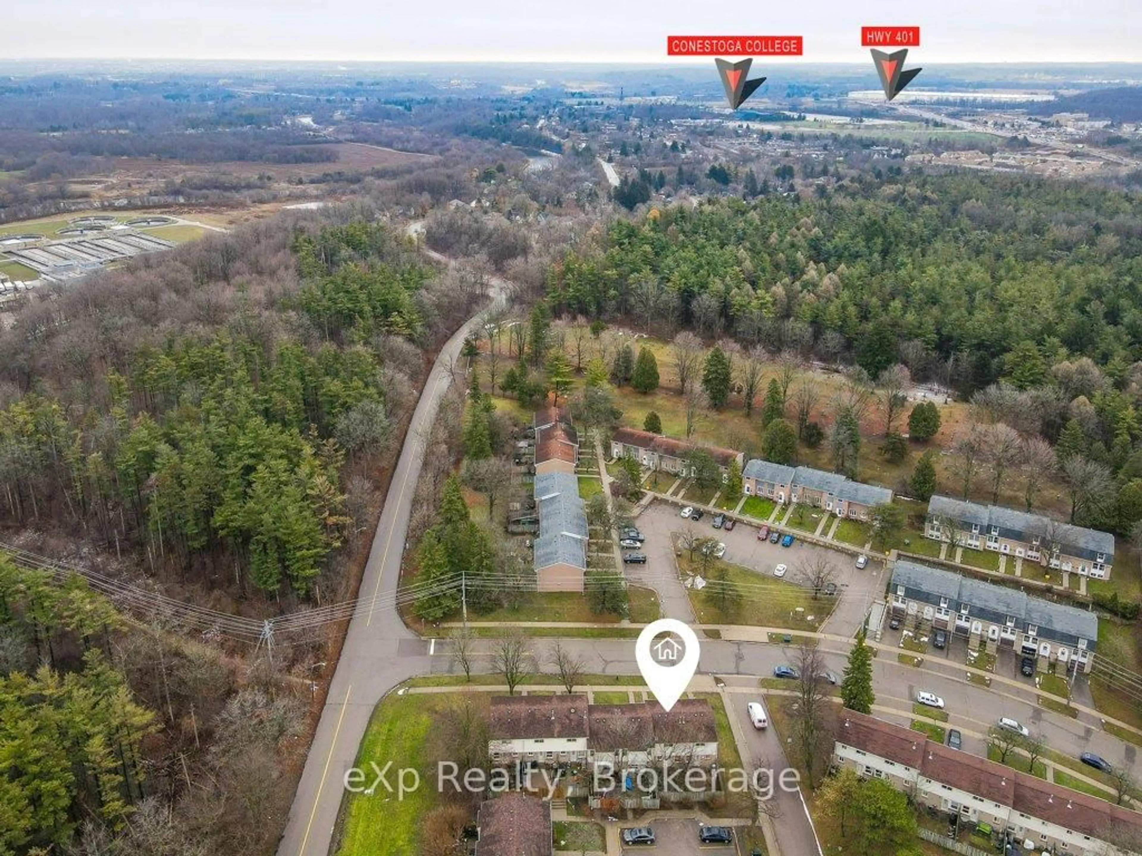 A pic from outside/outdoor area/front of a property/back of a property/a pic from drone, forest/trees view for 165 Green Valley Dr #2, Kitchener Ontario N2P 1K3