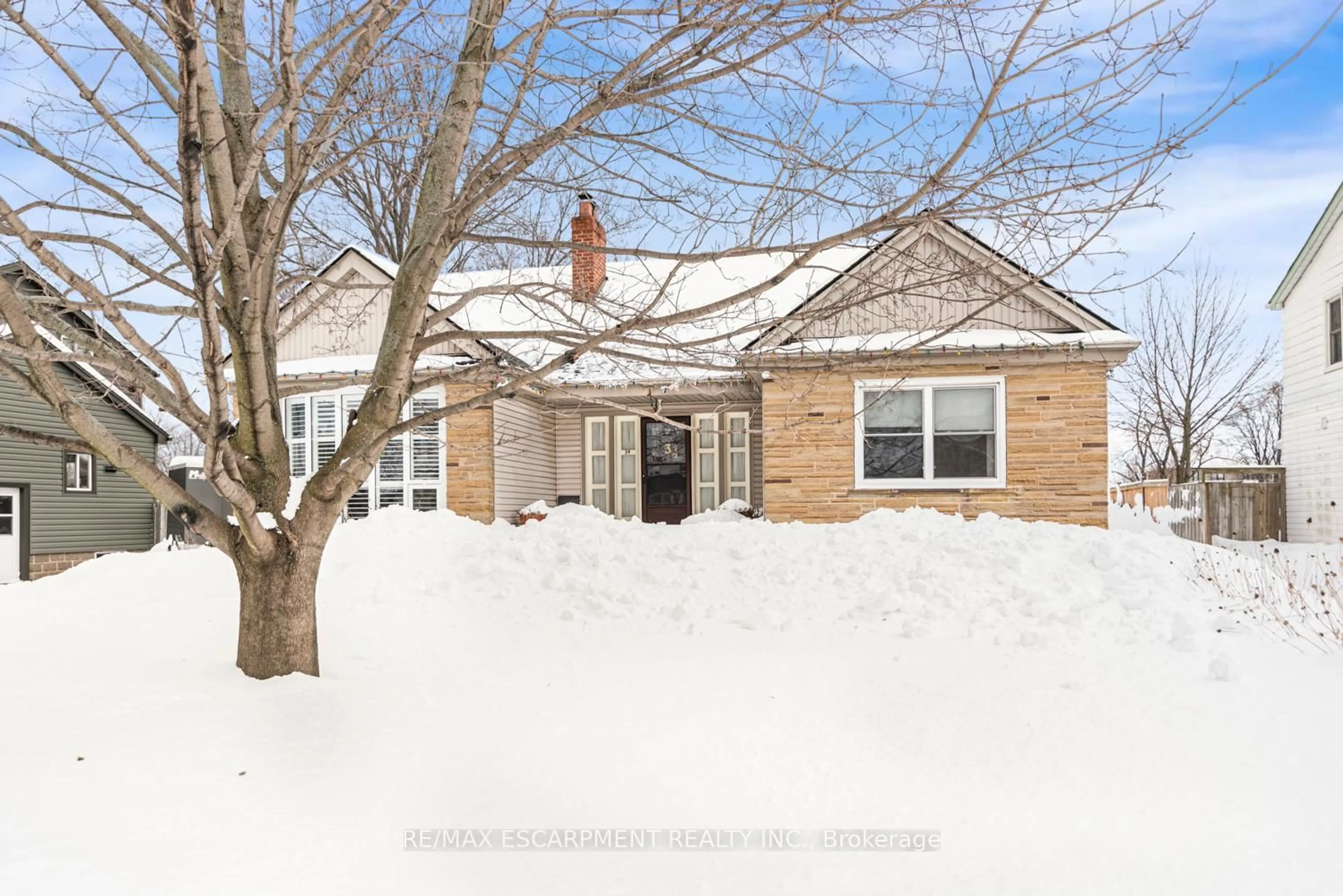 Home with brick exterior material, street for 34 Norwich Rd, Hamilton Ontario L8E 1Z8