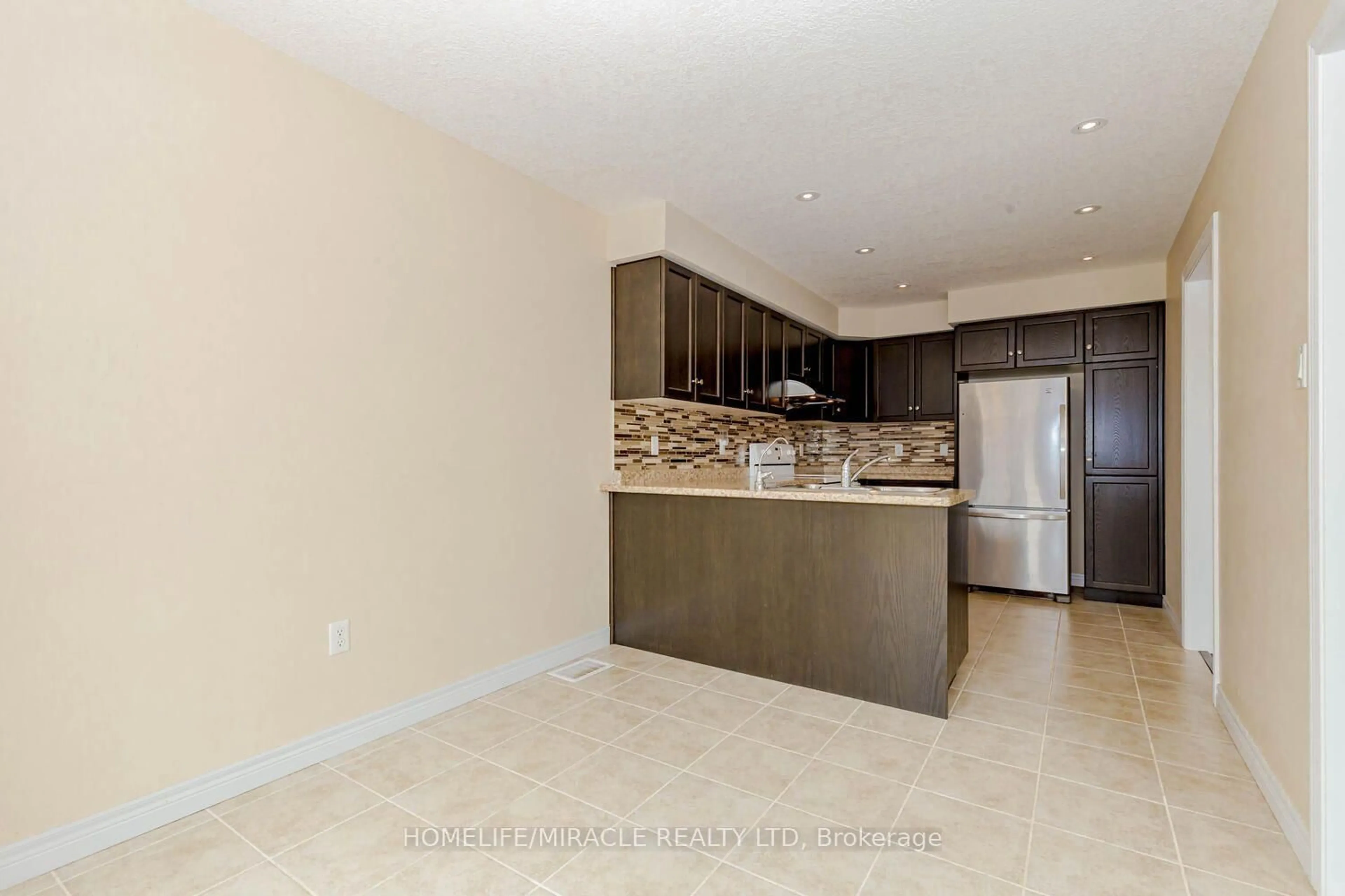 Open concept kitchen, ceramic/tile floor for 83 Oakes Cres, Guelph Ontario N1E 0J5