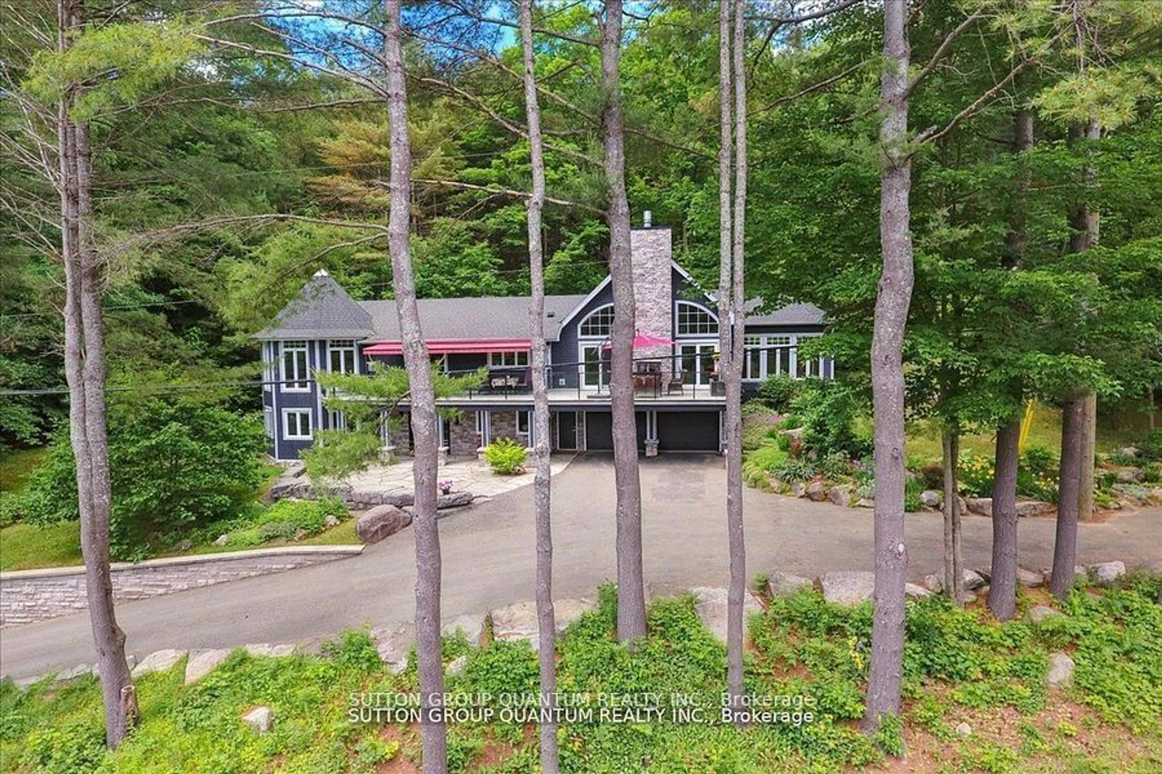 A pic from outside/outdoor area/front of a property/back of a property/a pic from drone, unknown for 167 Santas Village Rd, Bracebridge Ontario P1L 0N3