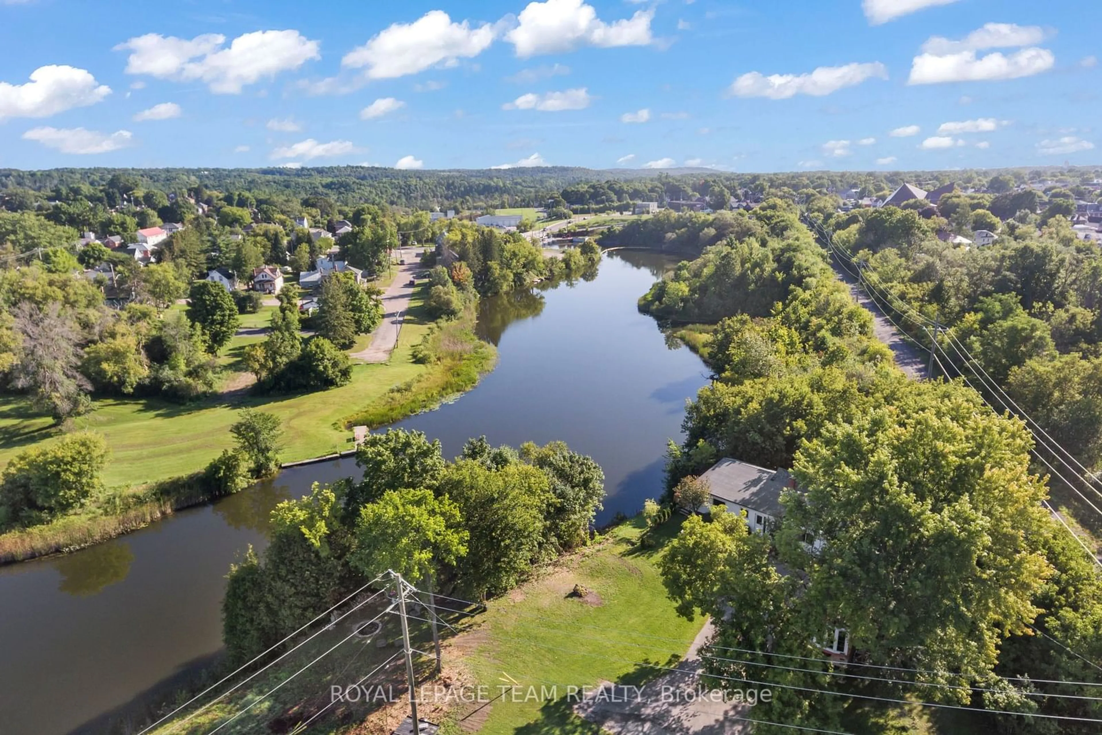 A pic from outside/outdoor area/front of a property/back of a property/a pic from drone, water/lake/river/ocean view for 215 June St, Renfrew Ontario K7V 2K2