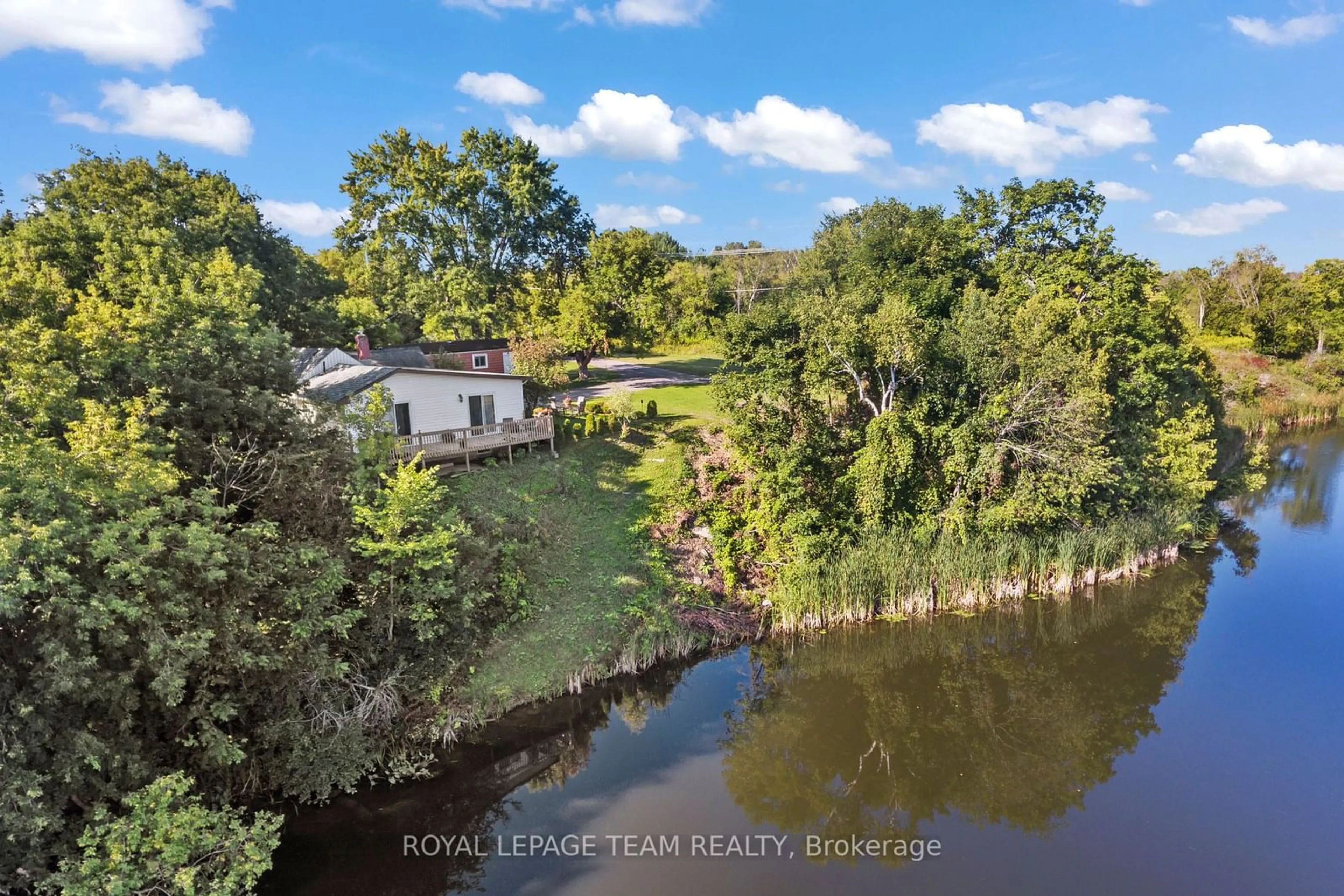 A pic from outside/outdoor area/front of a property/back of a property/a pic from drone, water/lake/river/ocean view for 215 June St, Renfrew Ontario K7V 2K2