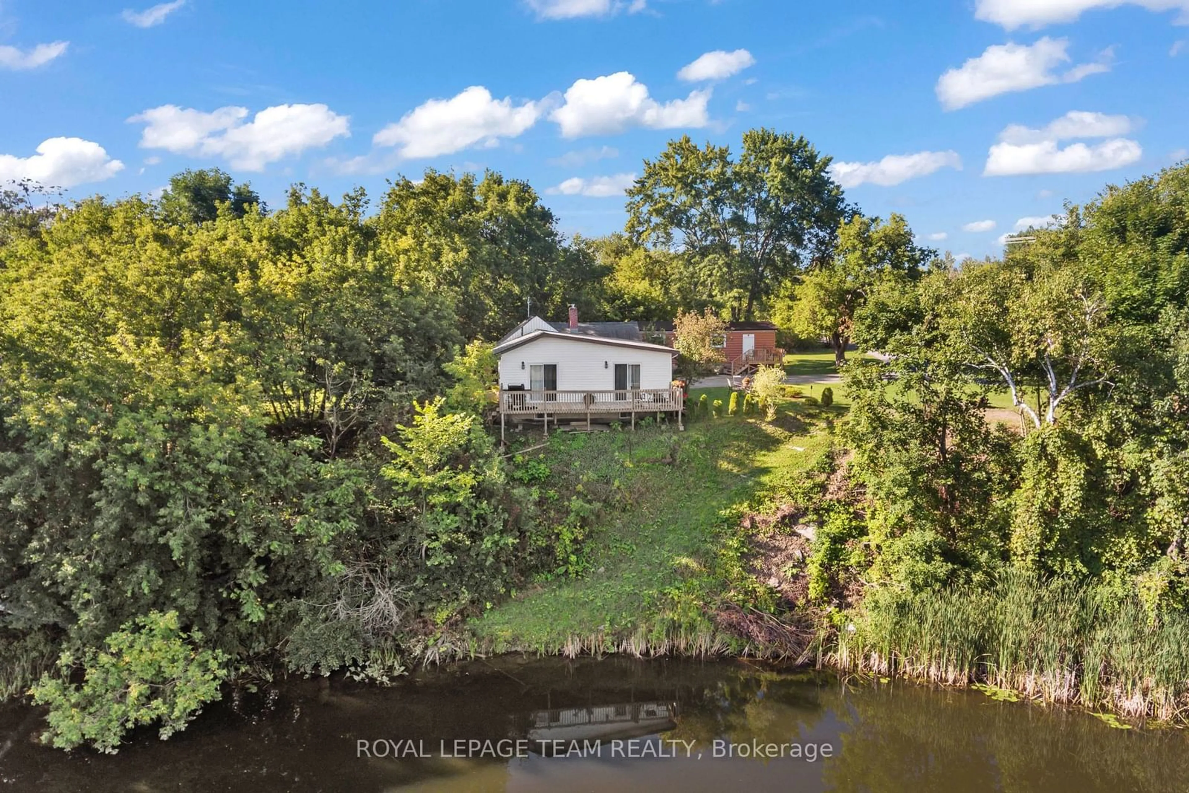 A pic from outside/outdoor area/front of a property/back of a property/a pic from drone, water/lake/river/ocean view for 215 June St, Renfrew Ontario K7V 2K2