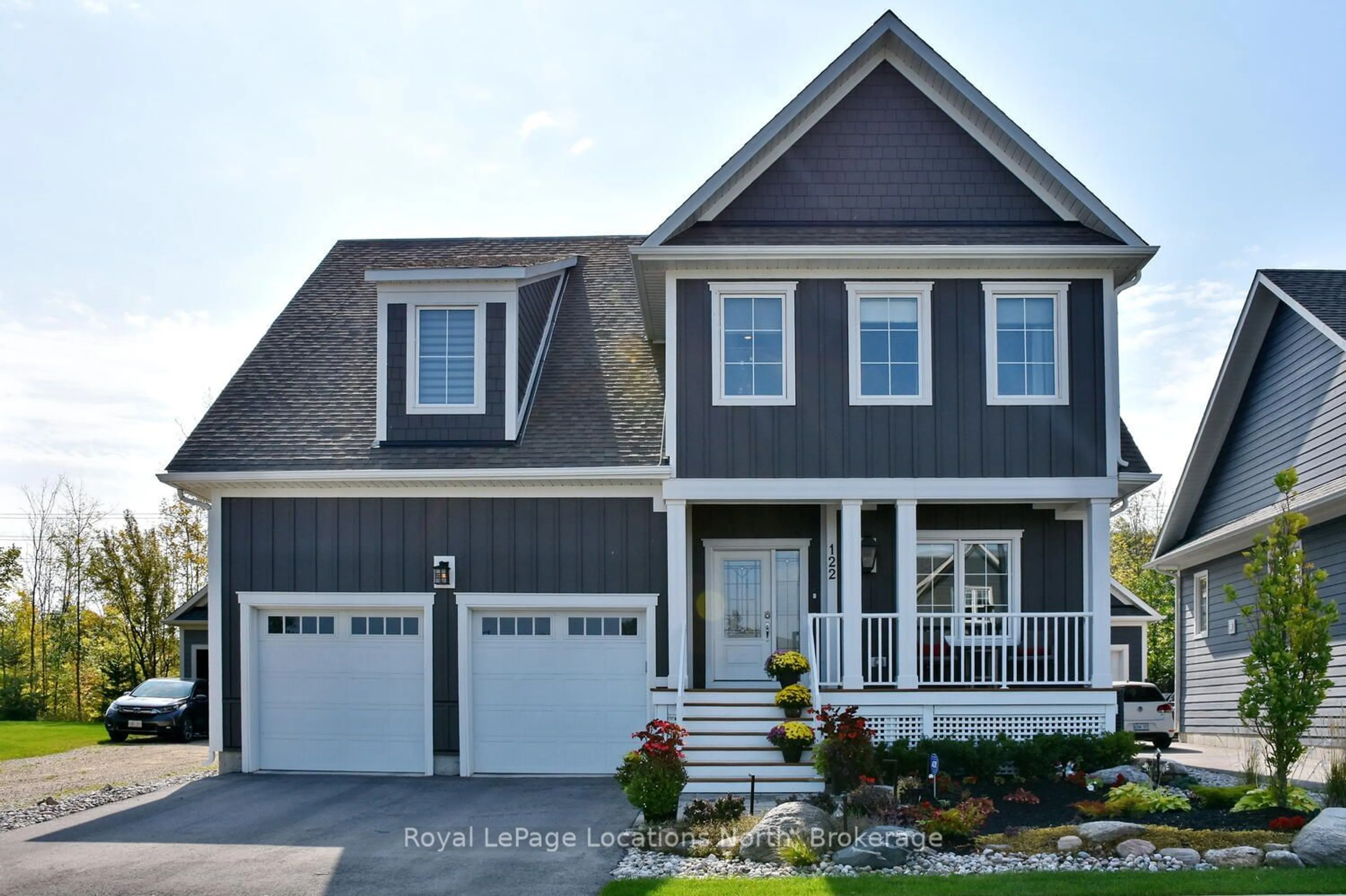 Home with vinyl exterior material, street for 122 YELLOW BIRCH Cres, Blue Mountains Ontario L9Y 0Y5