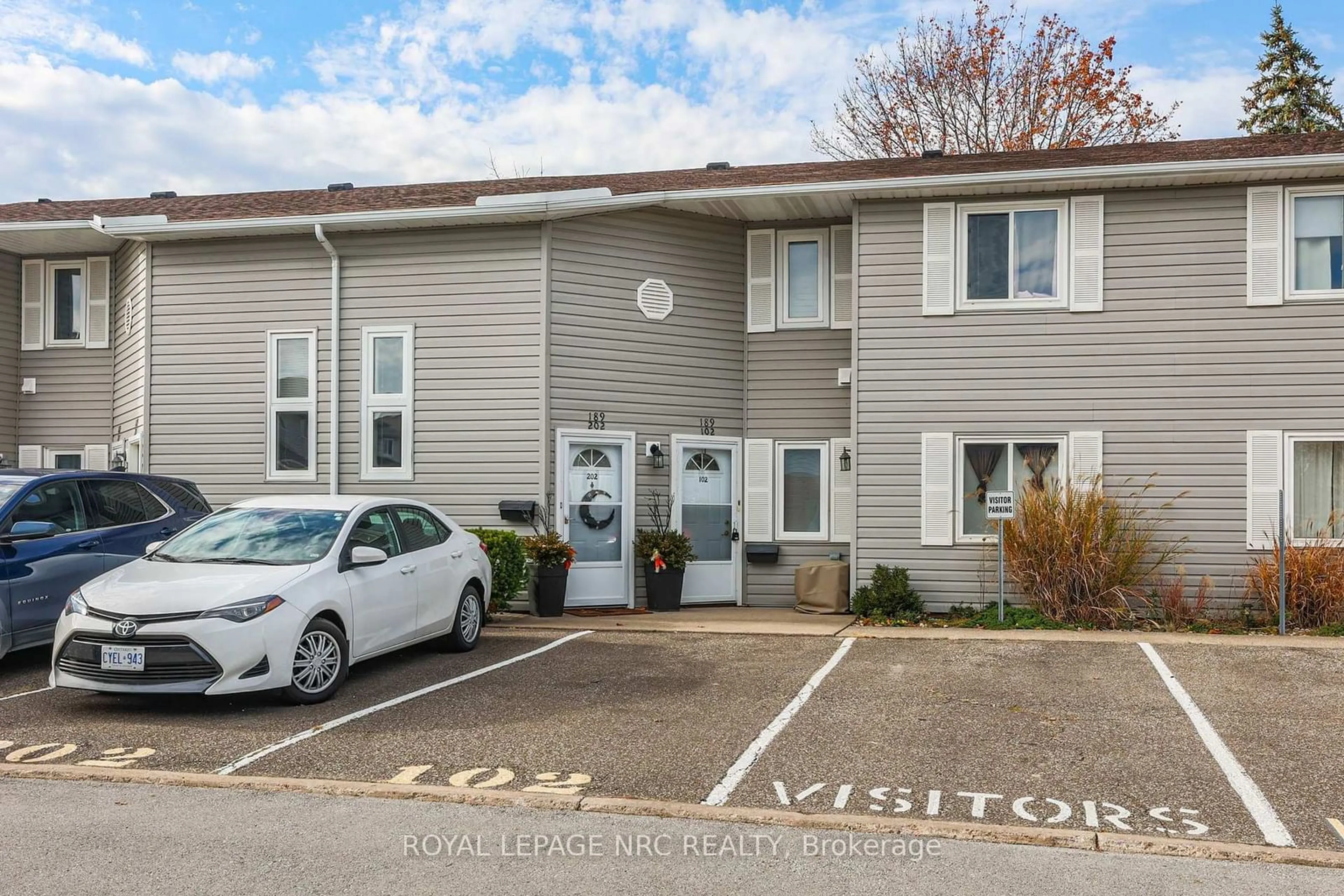 A pic from outside/outdoor area/front of a property/back of a property/a pic from drone, street for 189 Dorchester Blvd #102, St. Catharines Ontario L2M 7V8