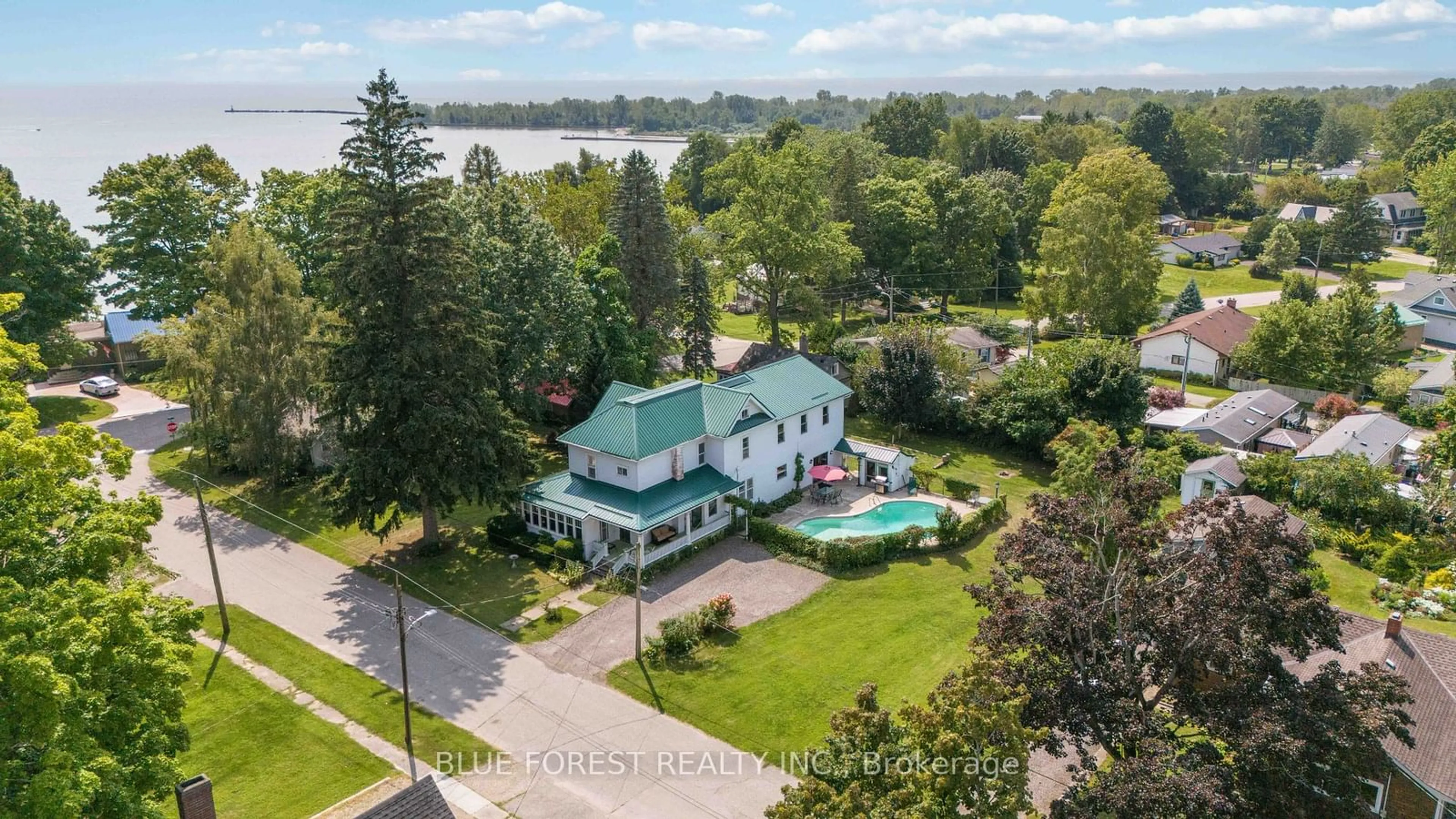 A pic from outside/outdoor area/front of a property/back of a property/a pic from drone, water/lake/river/ocean view for 13 Victoria St, Bayham Ontario N0J 1T0