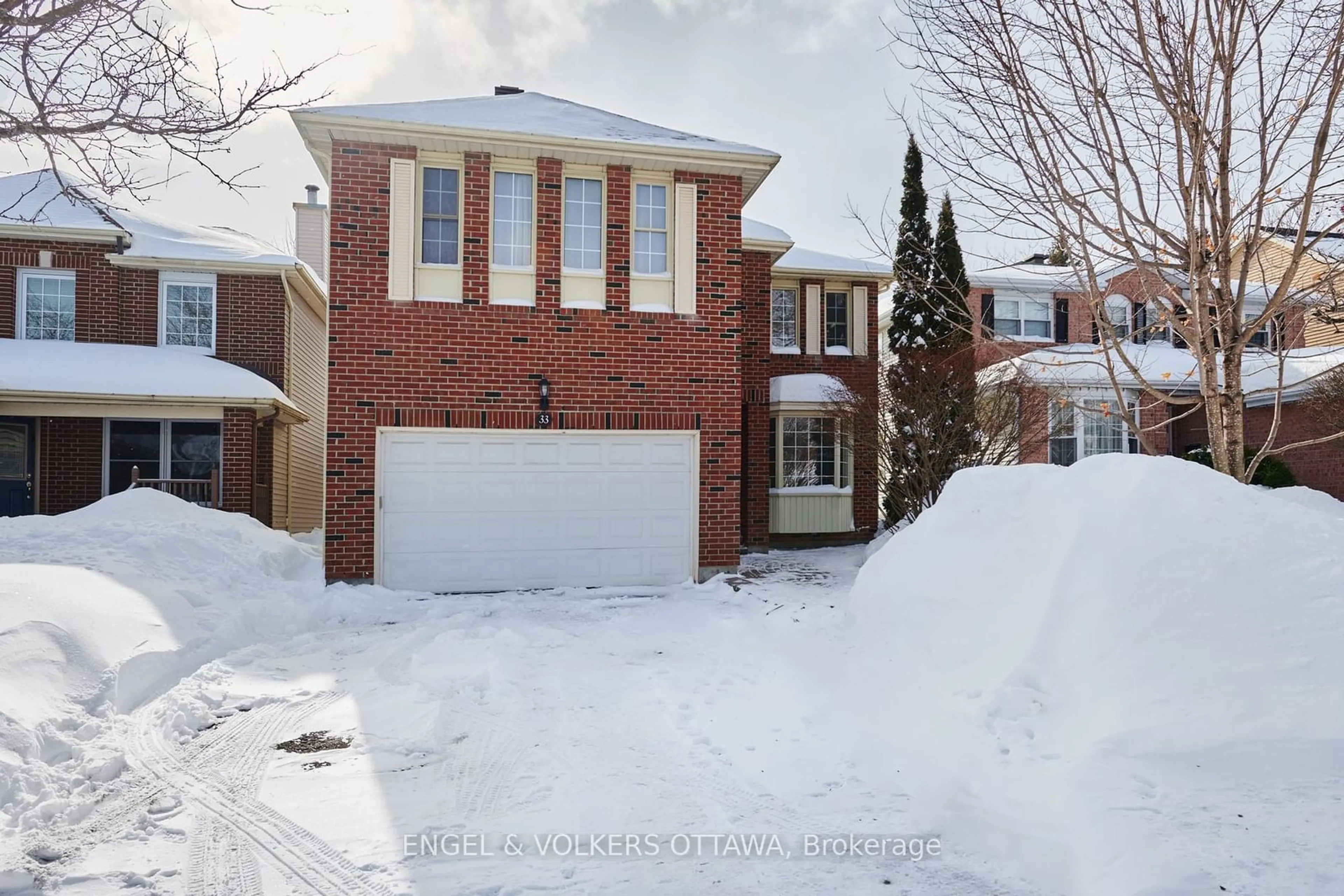 Home with brick exterior material, street for 33 Morgan's Grant Way, Kanata Ontario K2K 2G2