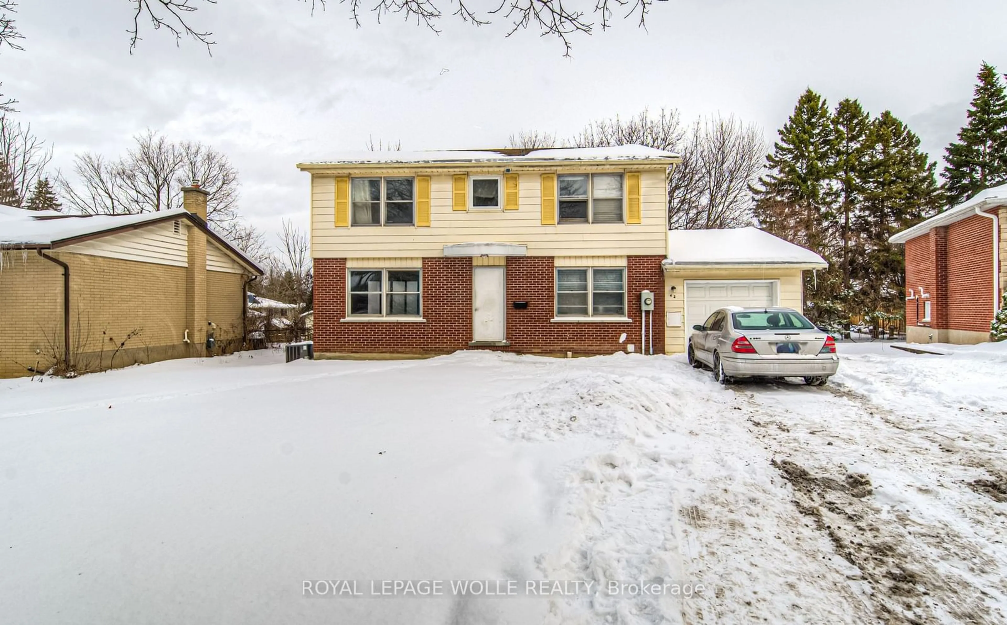 Home with brick exterior material, street for 42 Cardill Cres, Waterloo Ontario N2L 3Y6