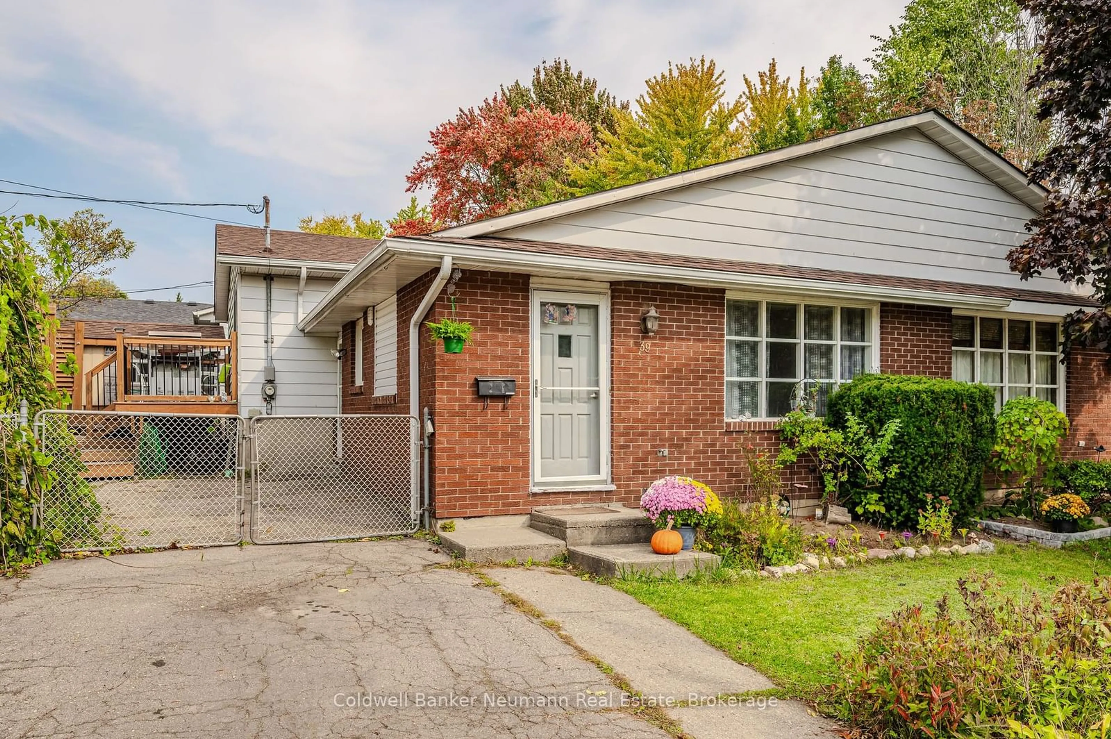 Home with brick exterior material, street for 39 INVERNESS Dr, Guelph Ontario N1E 3M1