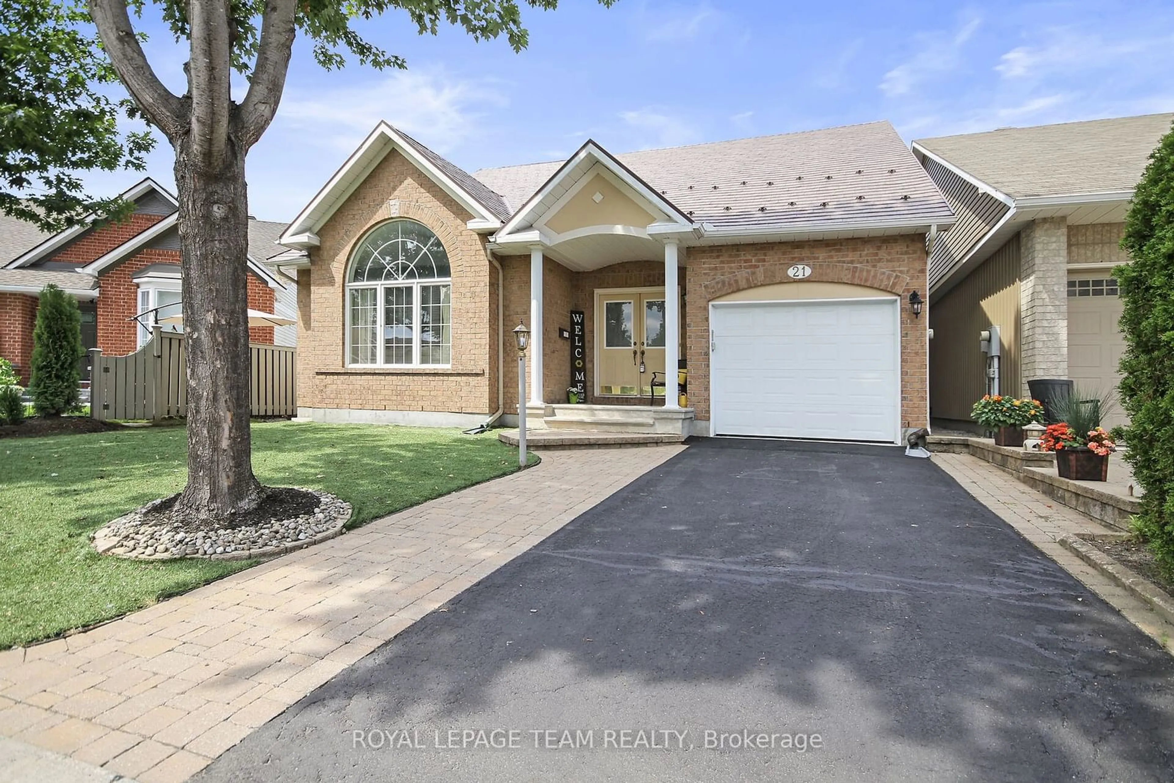 Home with brick exterior material, street for 21 Windchime Cres, Barrhaven Ontario K2G 6J3